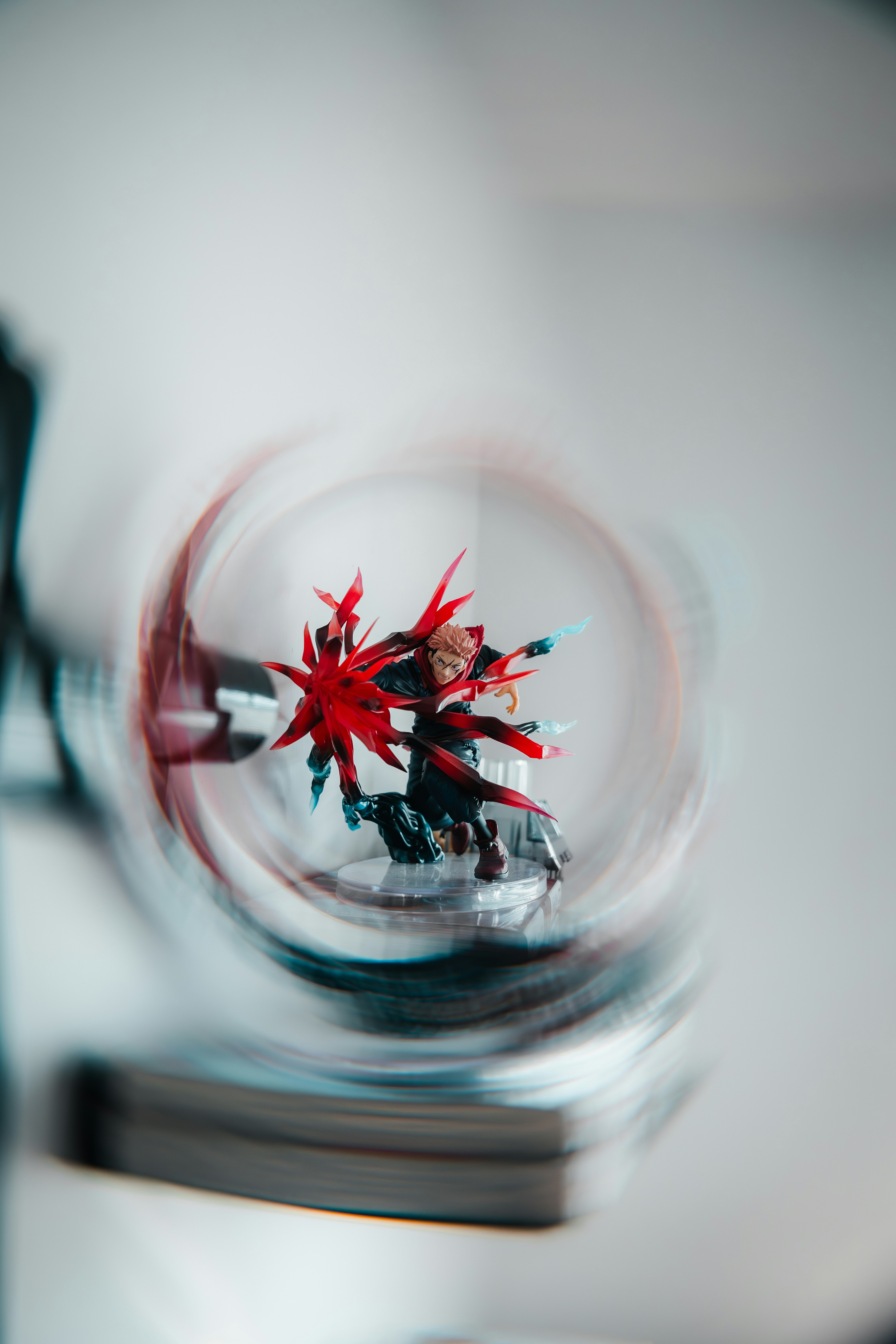 Action figure with red energy burst effect