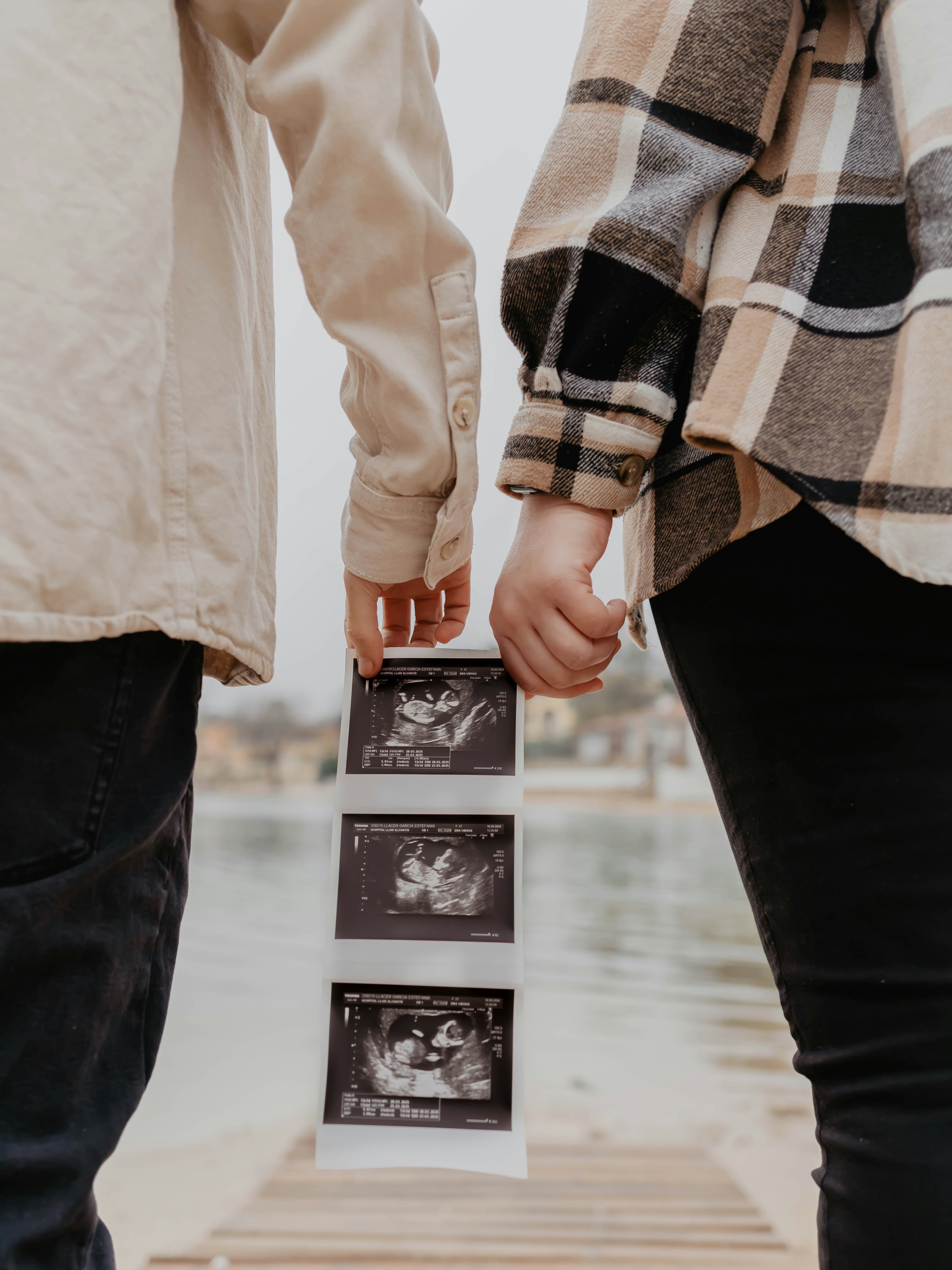 Entrepreneur calculating costs for an elective ultrasound business at a desk