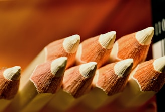Several sharpened colored pencils in a row.