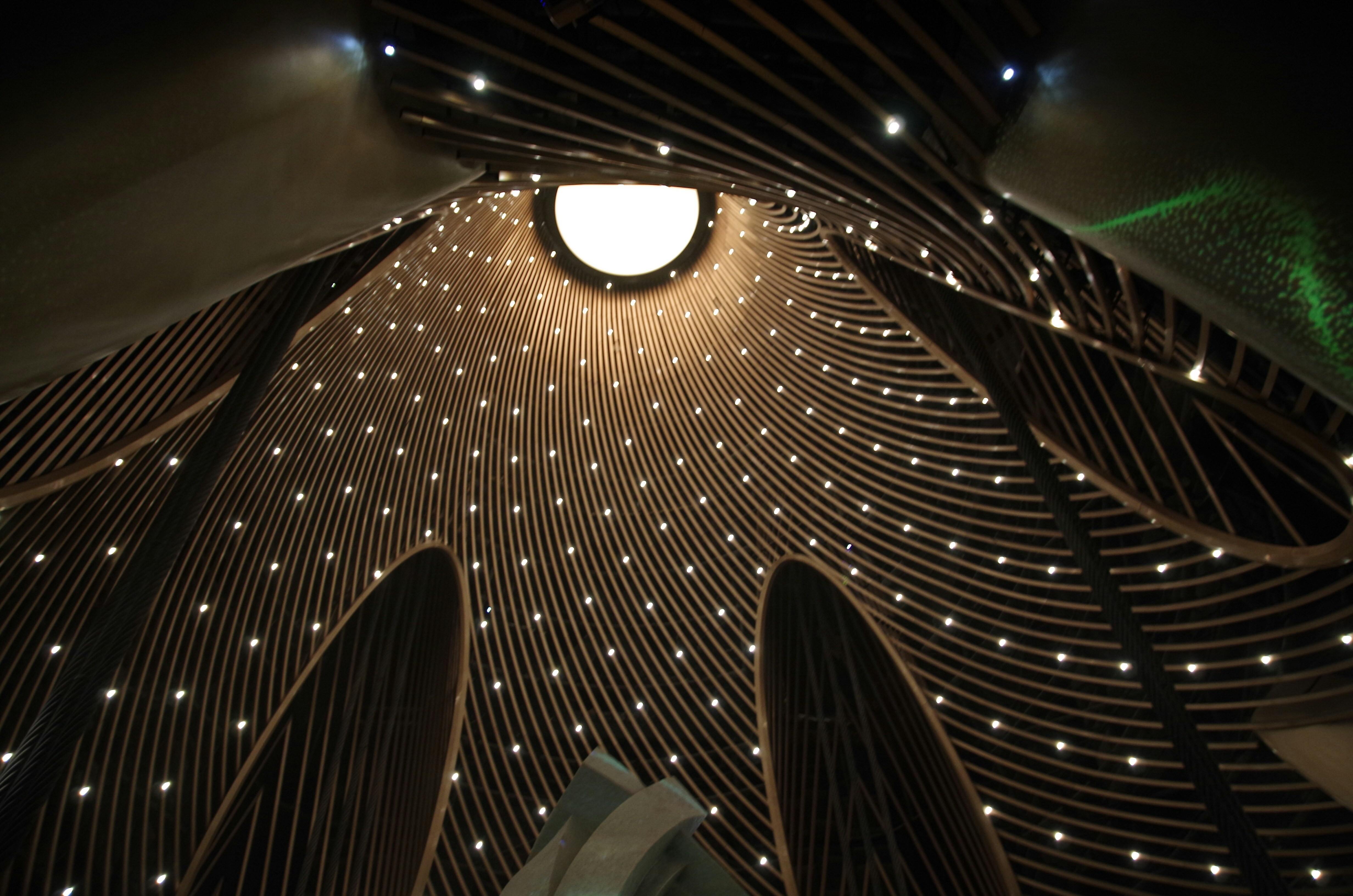 An elegant false ceiling design with integrated lighting.