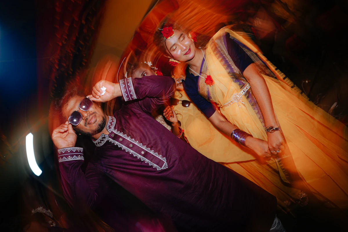 Couple dancing at a sangeet celebration