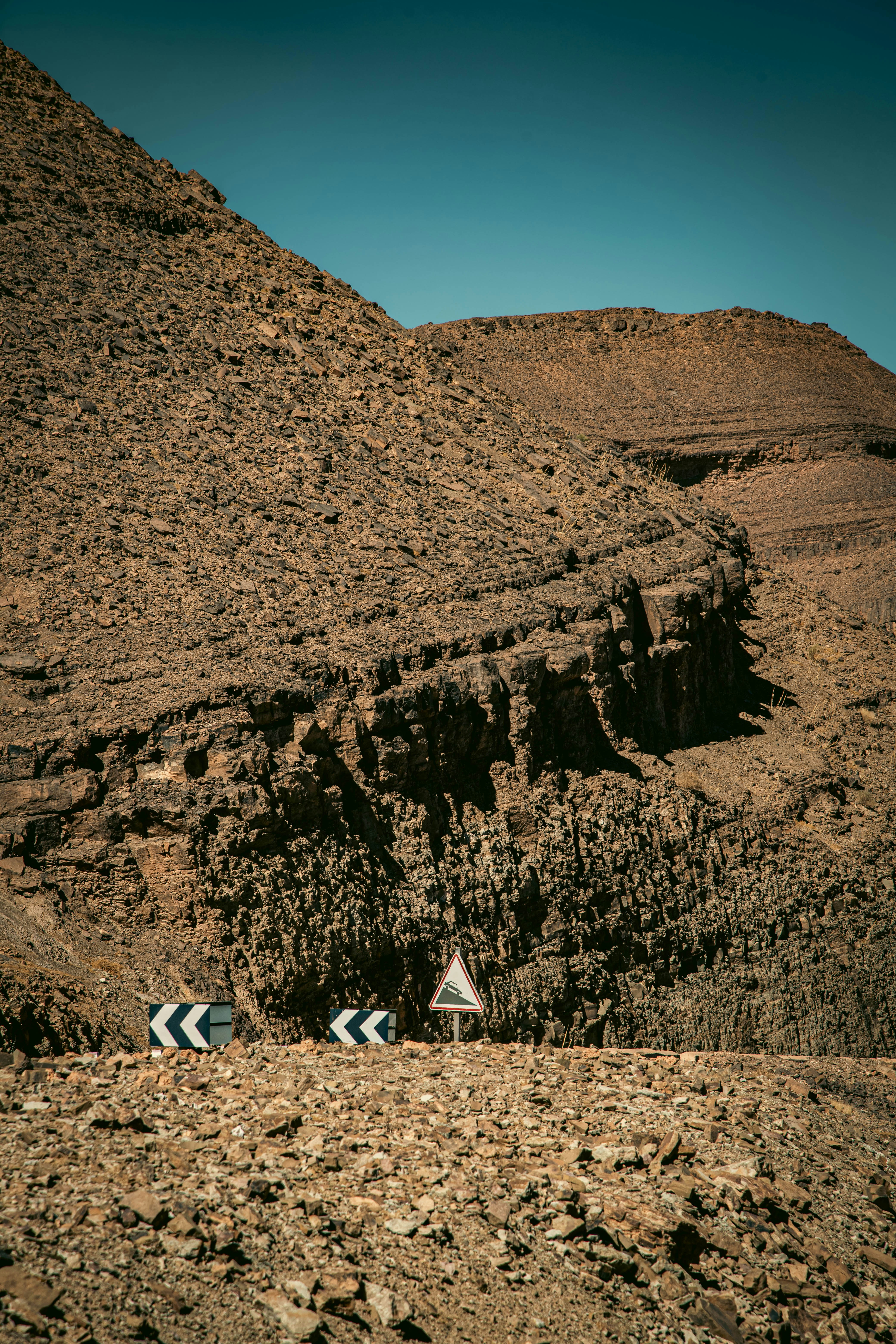 Desert road with sharp turns and rocky mountains