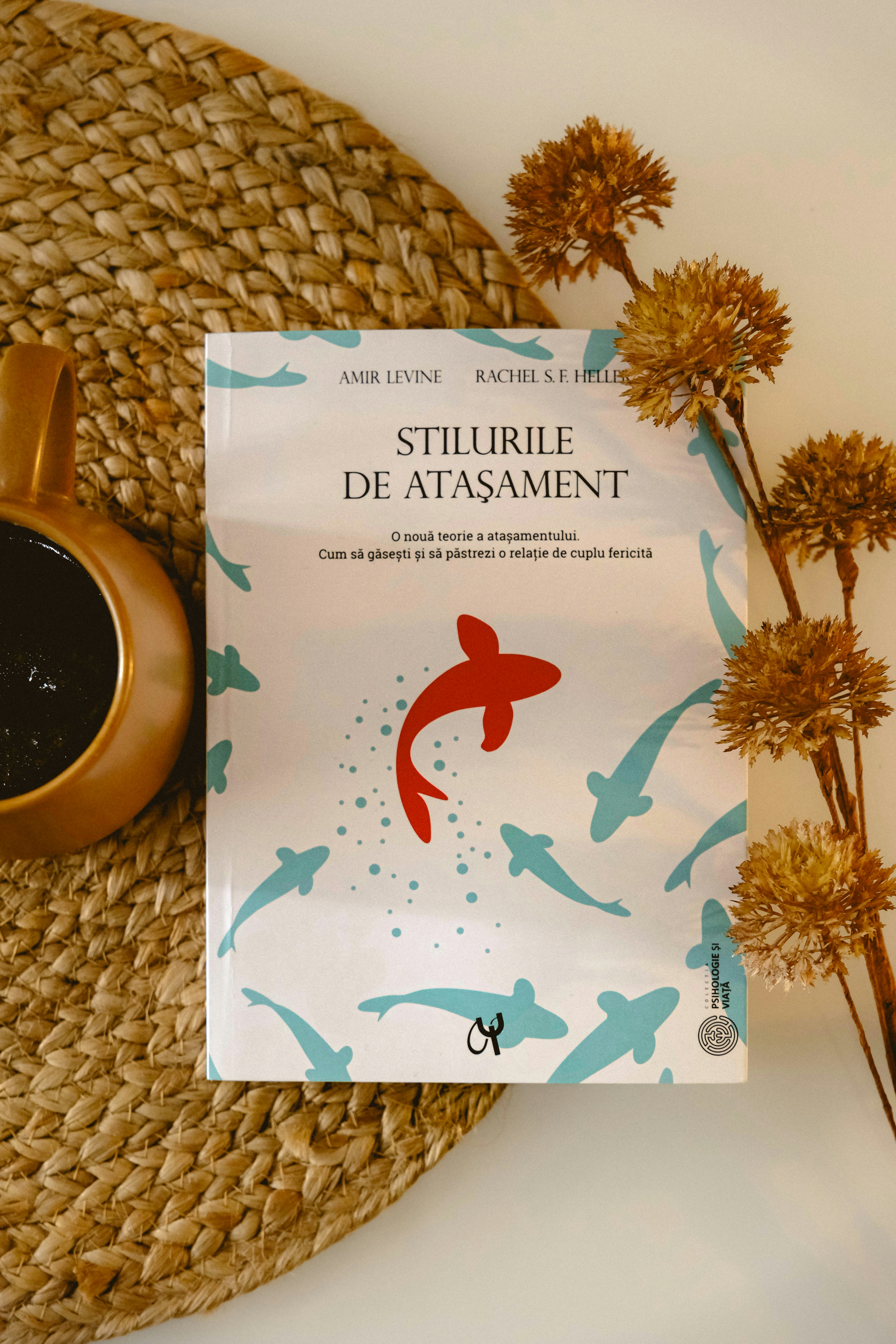 Book cover with fish design and coffee cup
