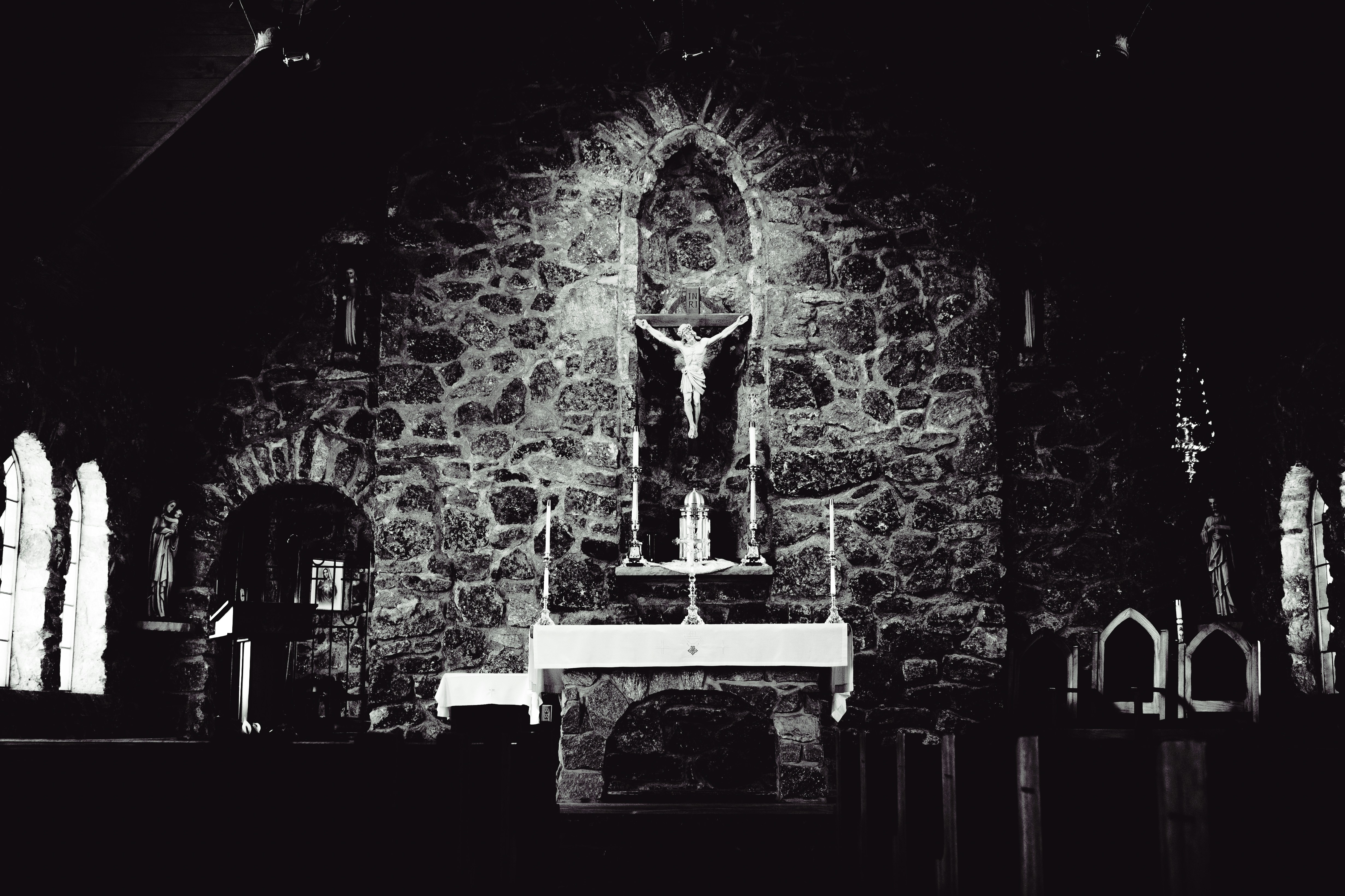Interior of a stone church with altar and altar
