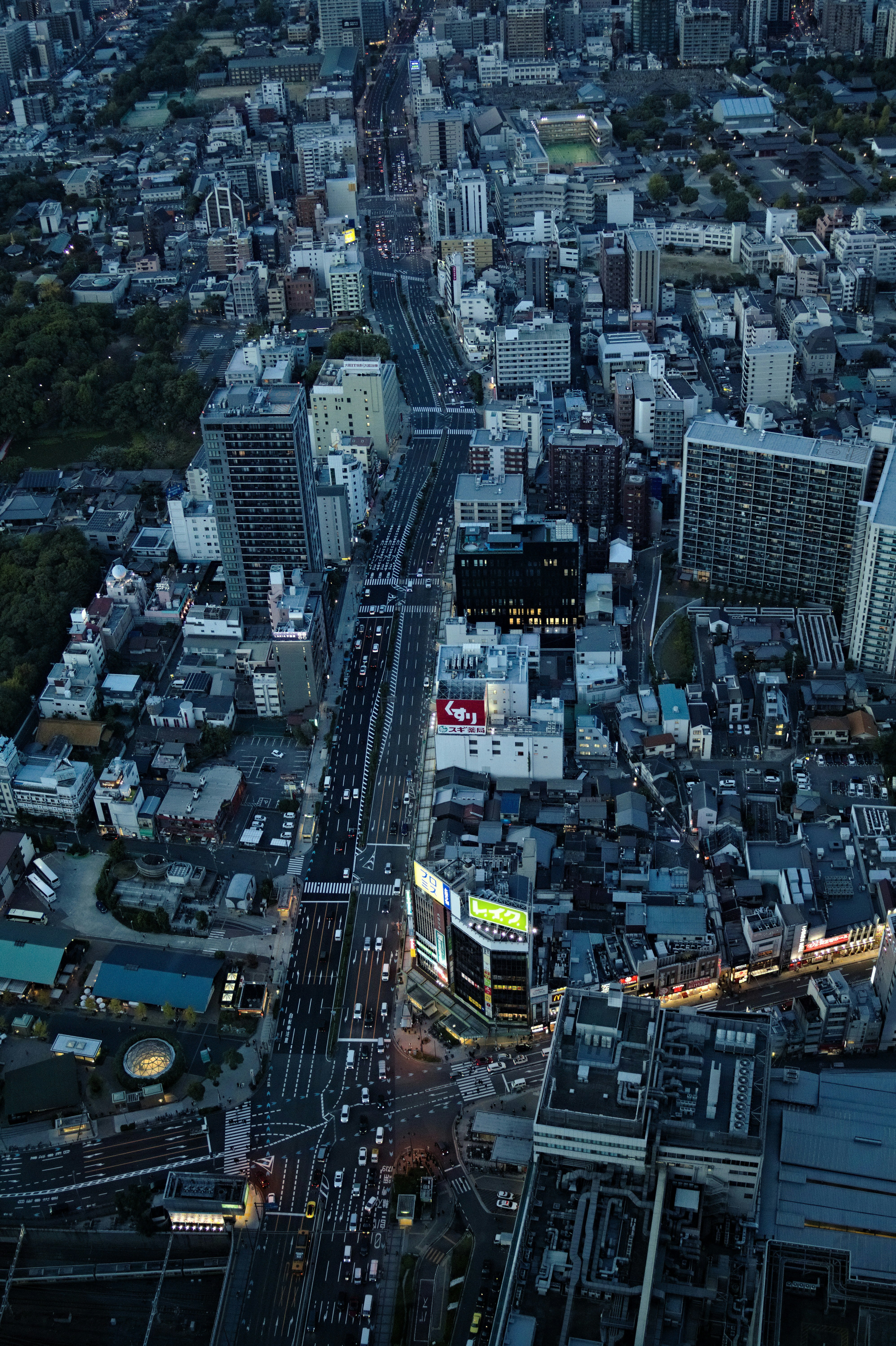 Aerial view of a busy city street at dusk