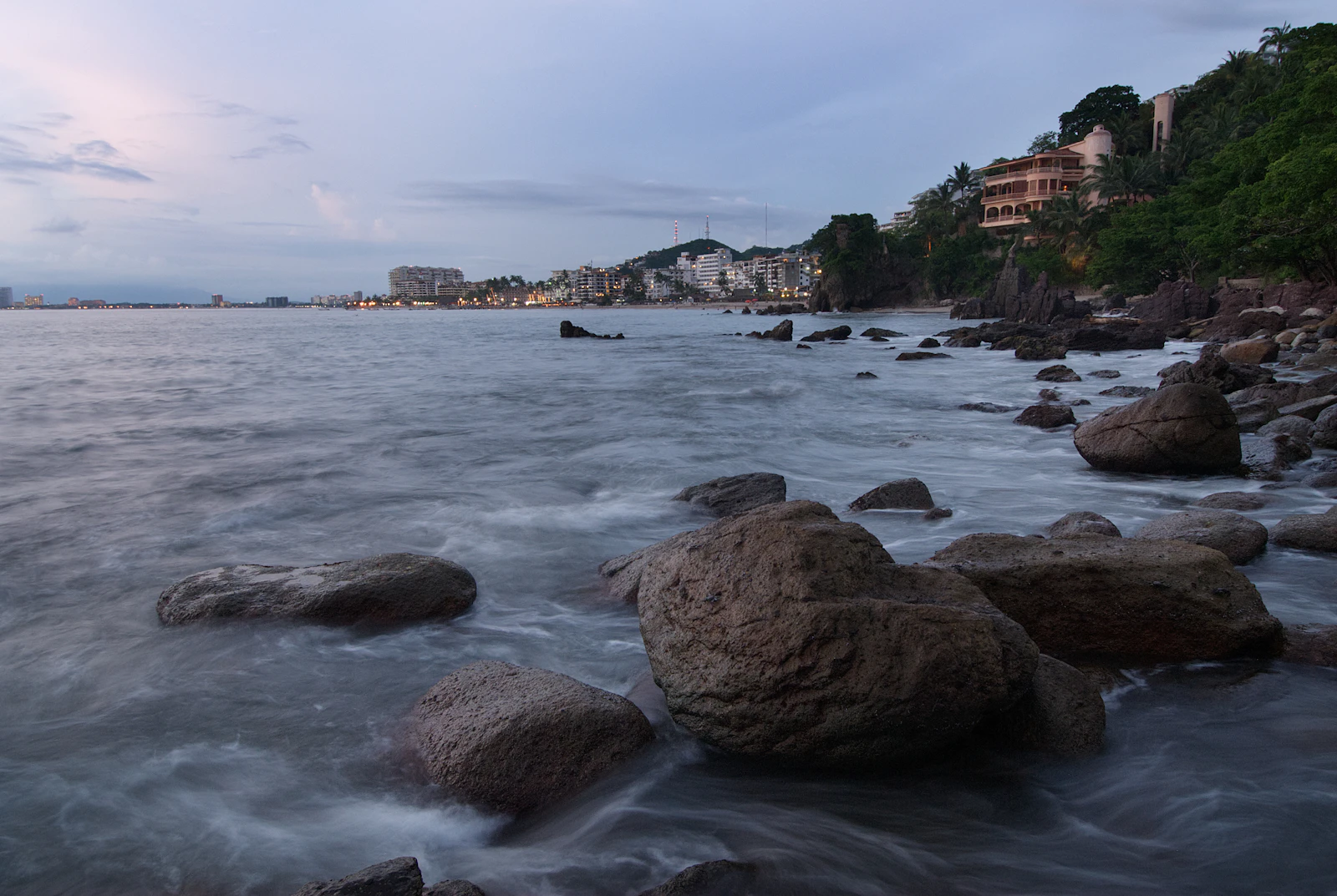 Rocky Puerto Vallarta coastline at dusk