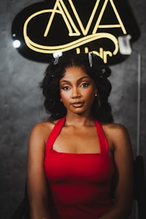 Woman with styled hair in a red dress