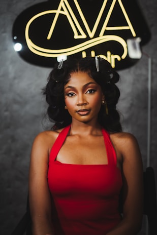 Woman with styled hair in a red dress