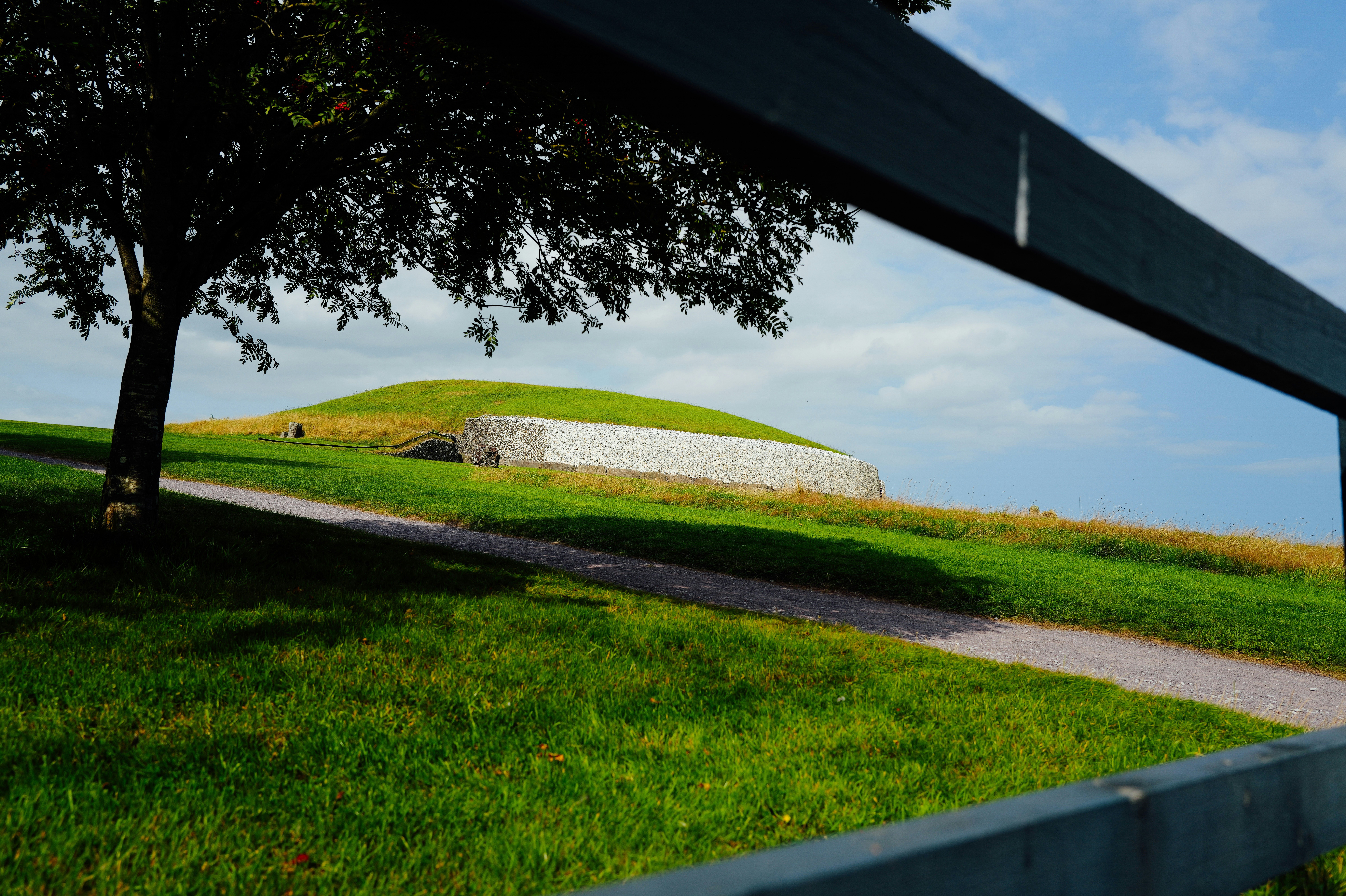 Green grassy hill with a concrete structure
