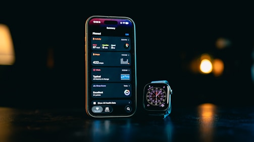 Smartphone and smartwatch displaying apps on-screen data