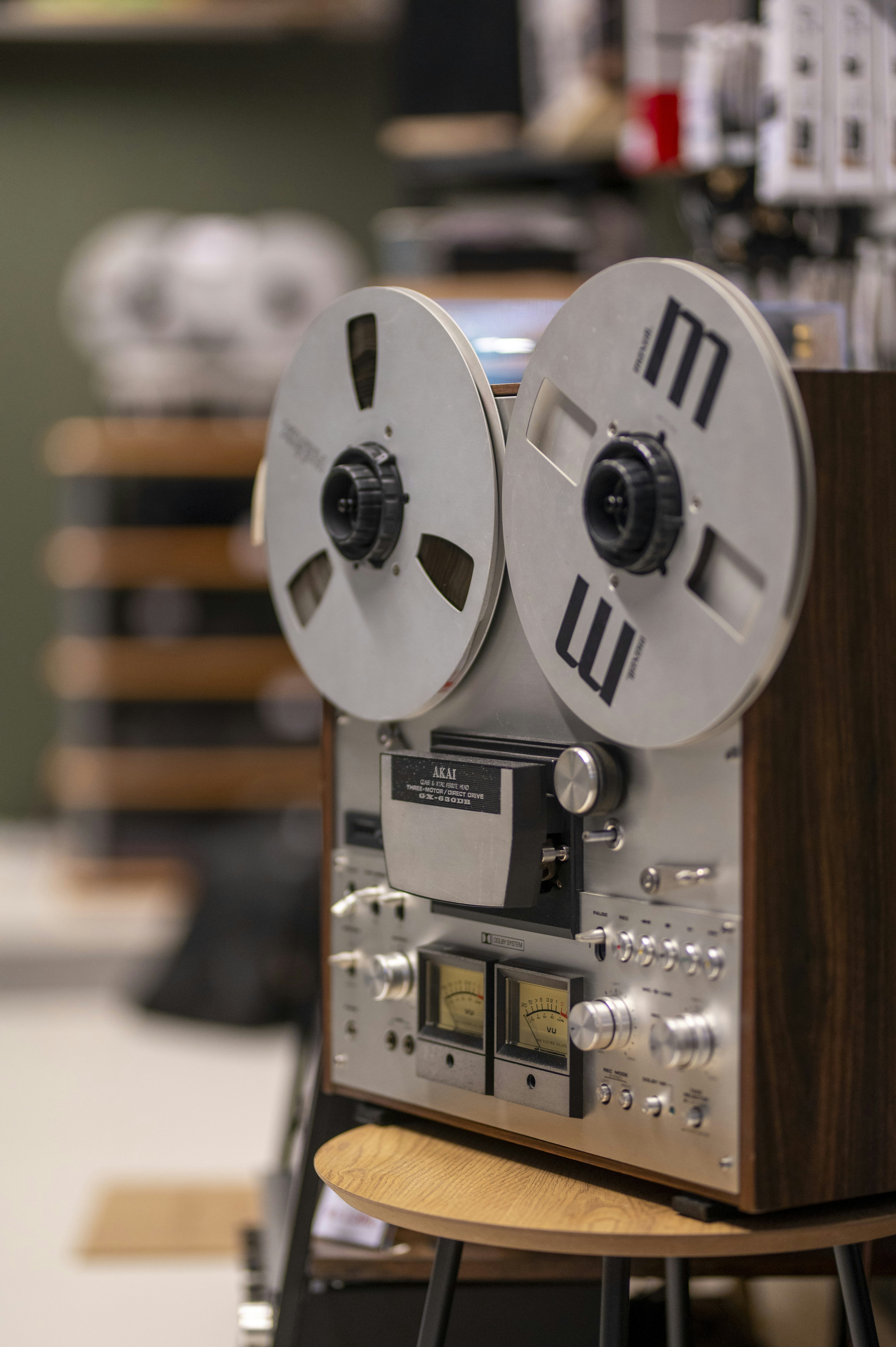 Vintage reel-to-reel tape recorder with large spools.
