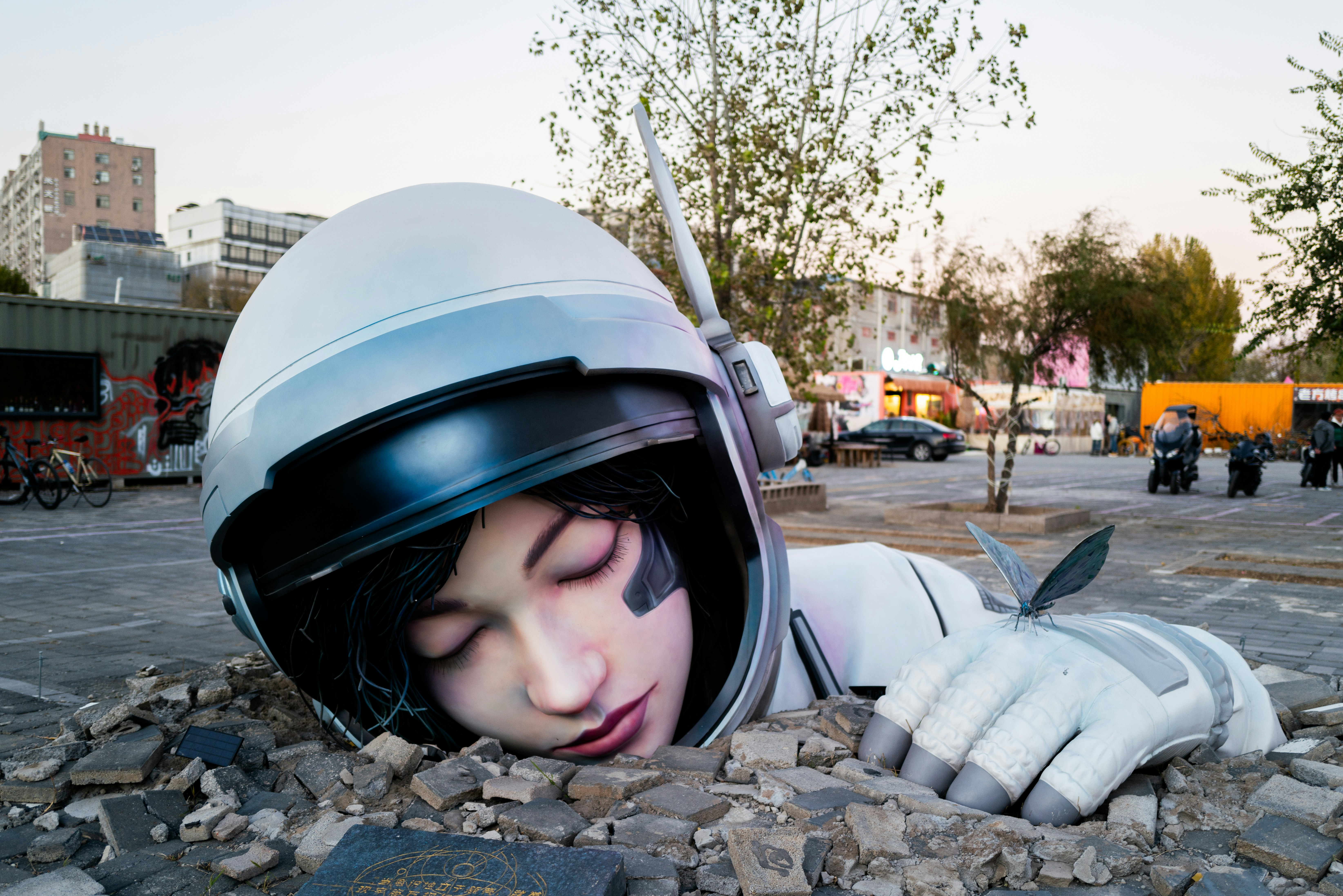 Astronaut emerges from rubble with debris