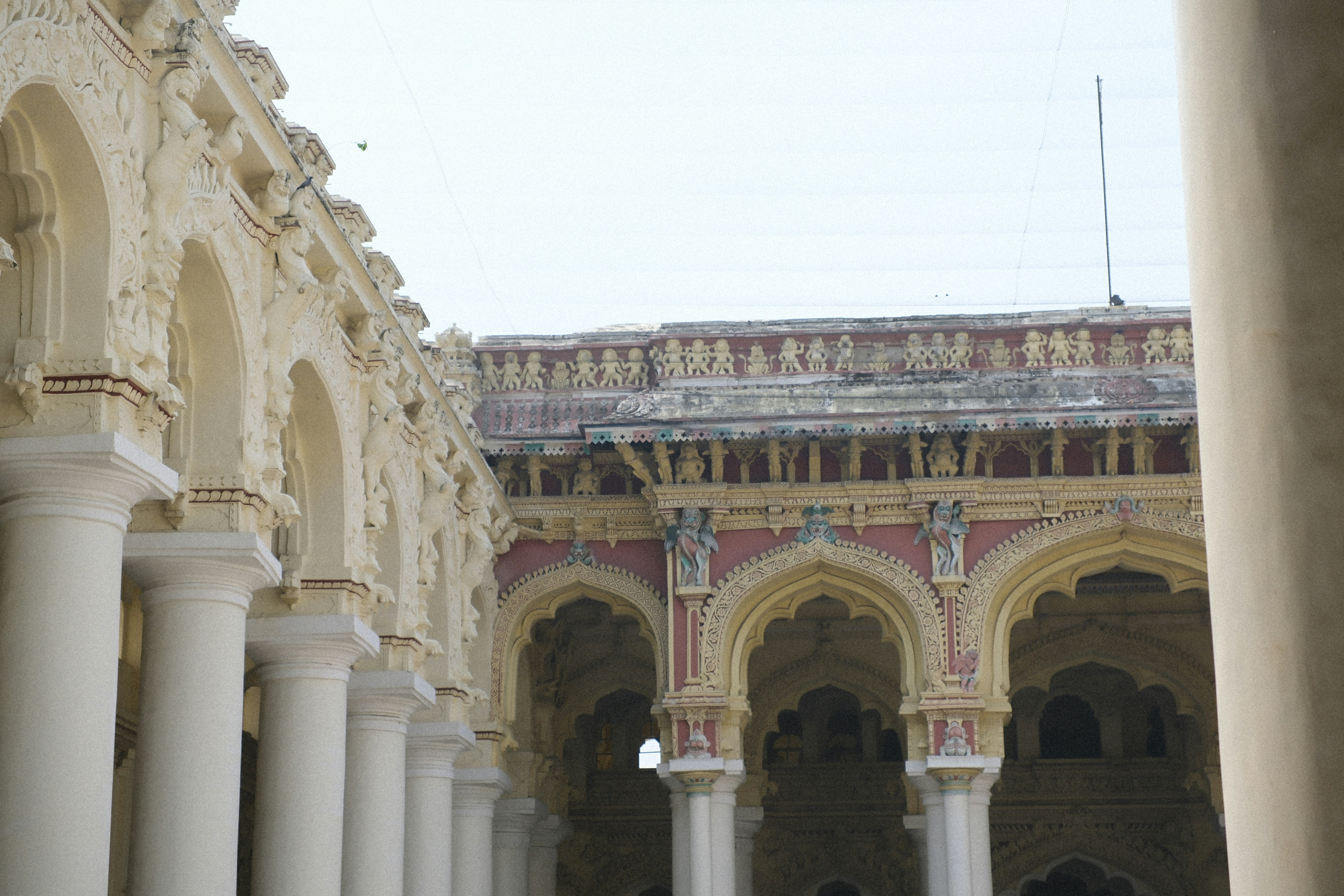 Ornate arches and columns of an ancient building.