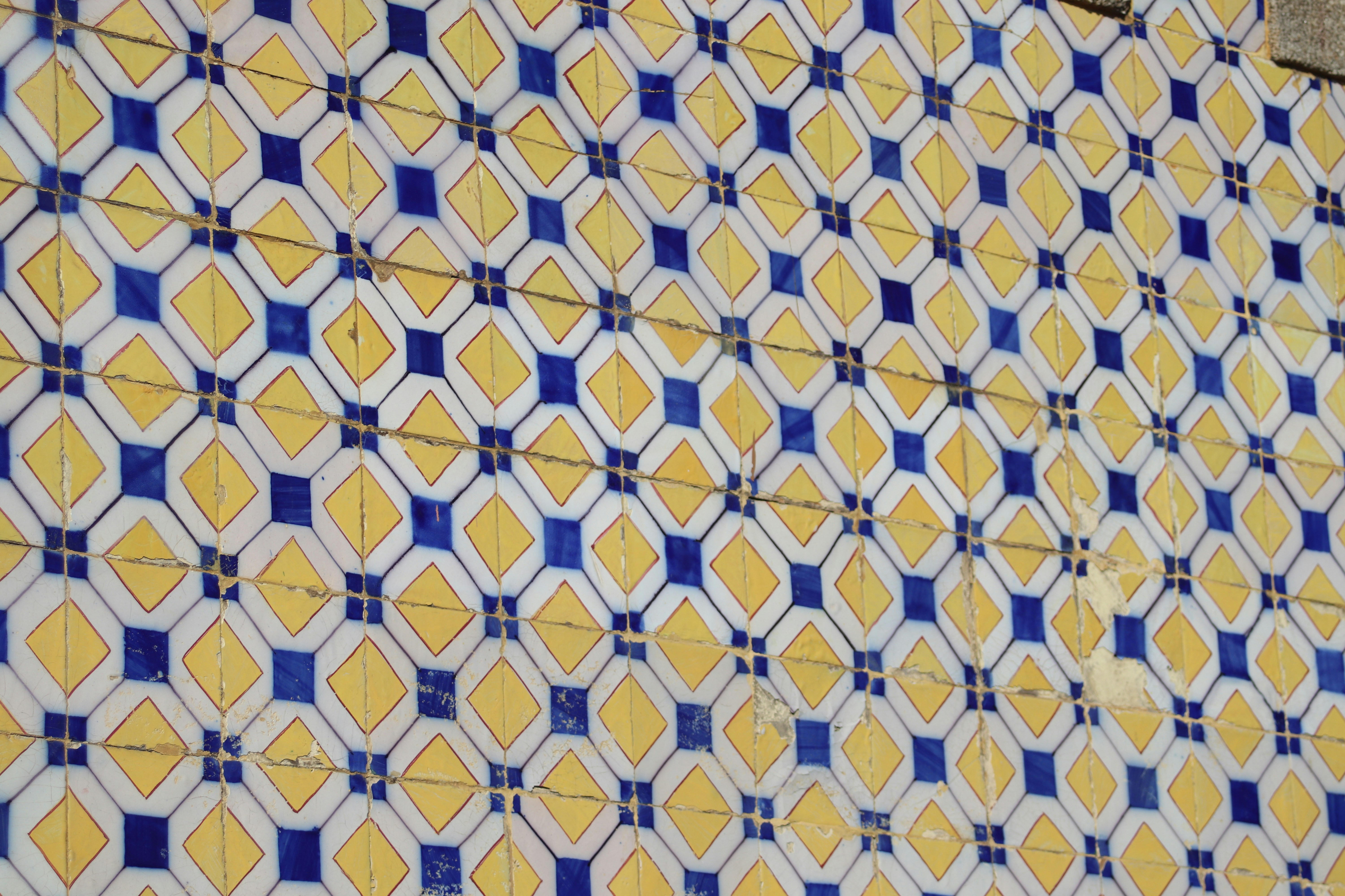 Yellow and blue geometric patterned tiles