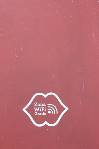 Lips symbol with zona wifi gratis text