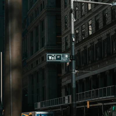 Wall street sign on a building facade