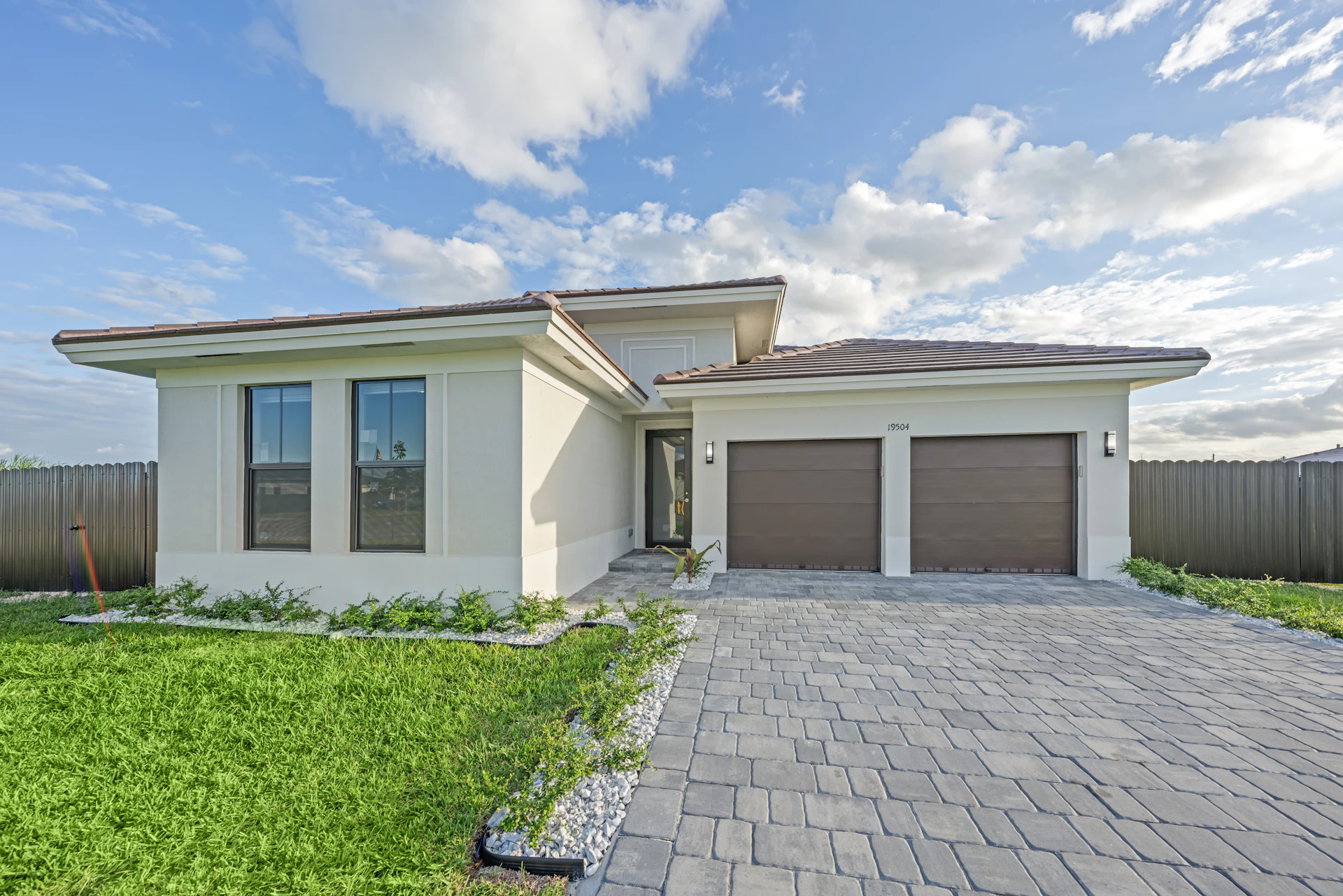 Modern home with a freshly laid block-paved driveway