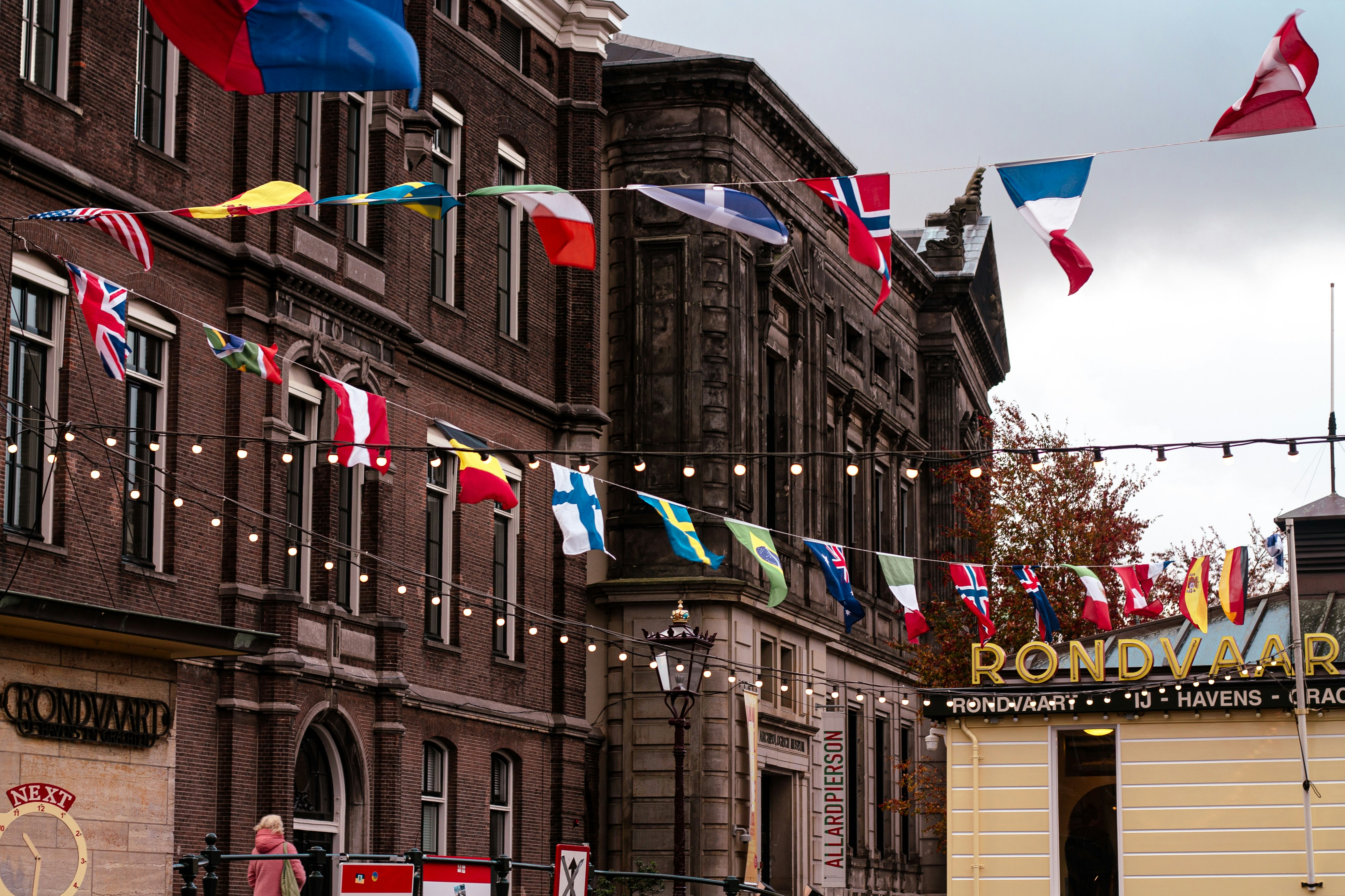 Building facade decorated with international flags