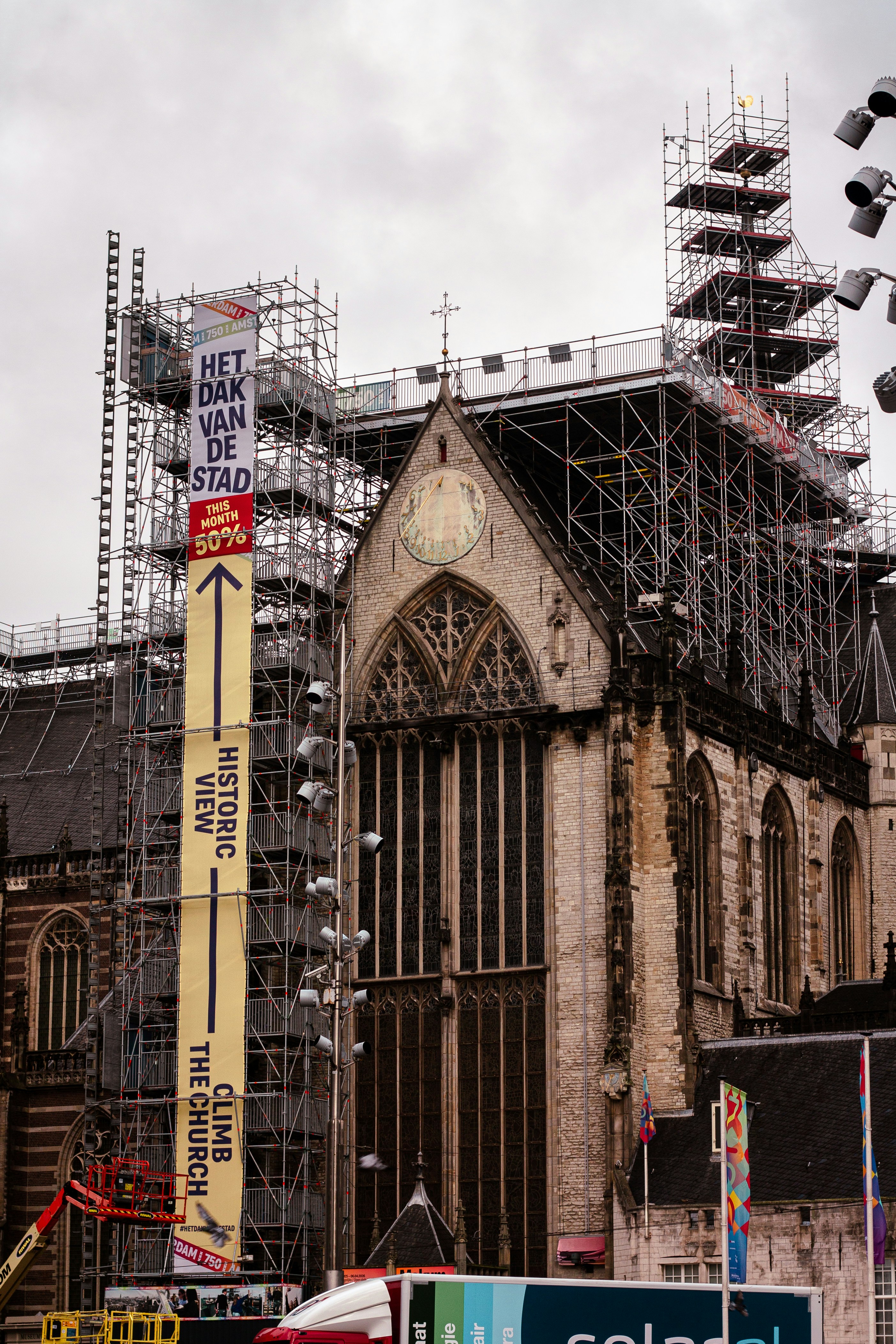 Church undergoing renovation with extensive scaffolding.