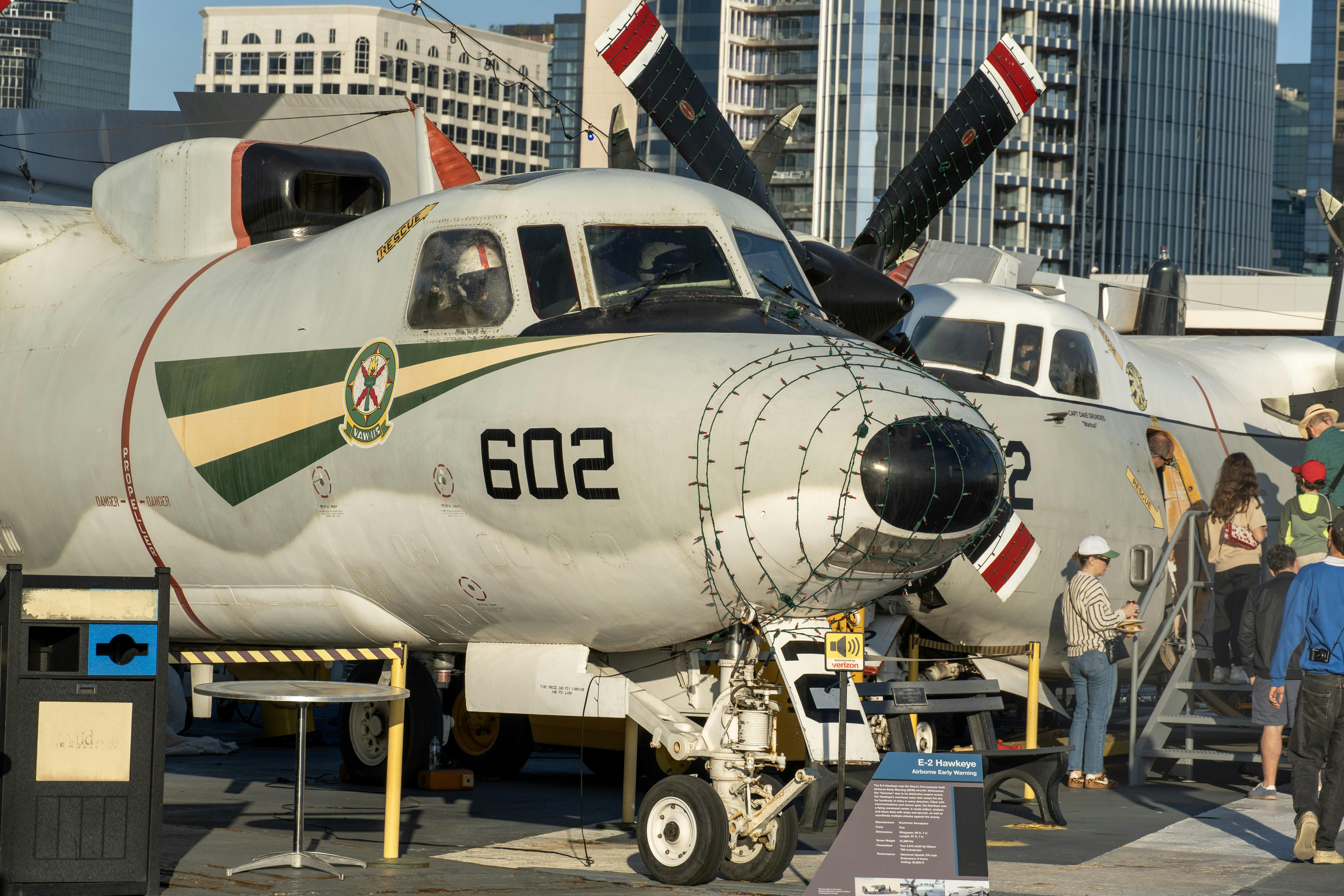 Two large military aircraft parked on a tarmac.