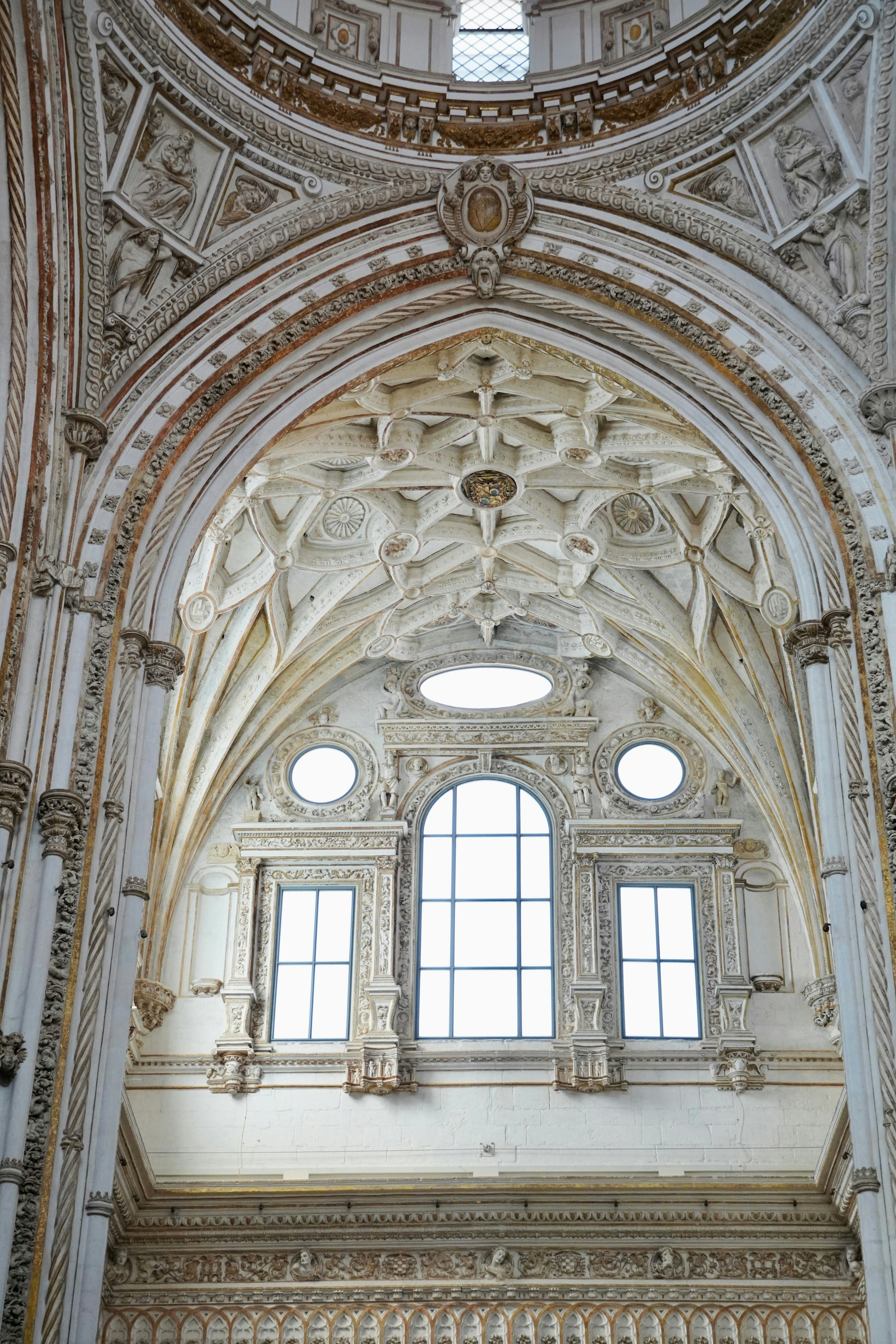 Intricate moorish architecture with ornate ceiling details.