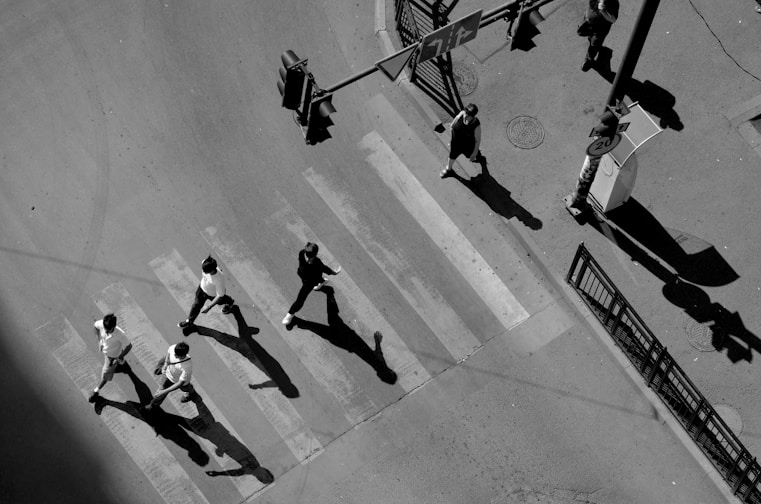 People crossing a street at a crosswalk