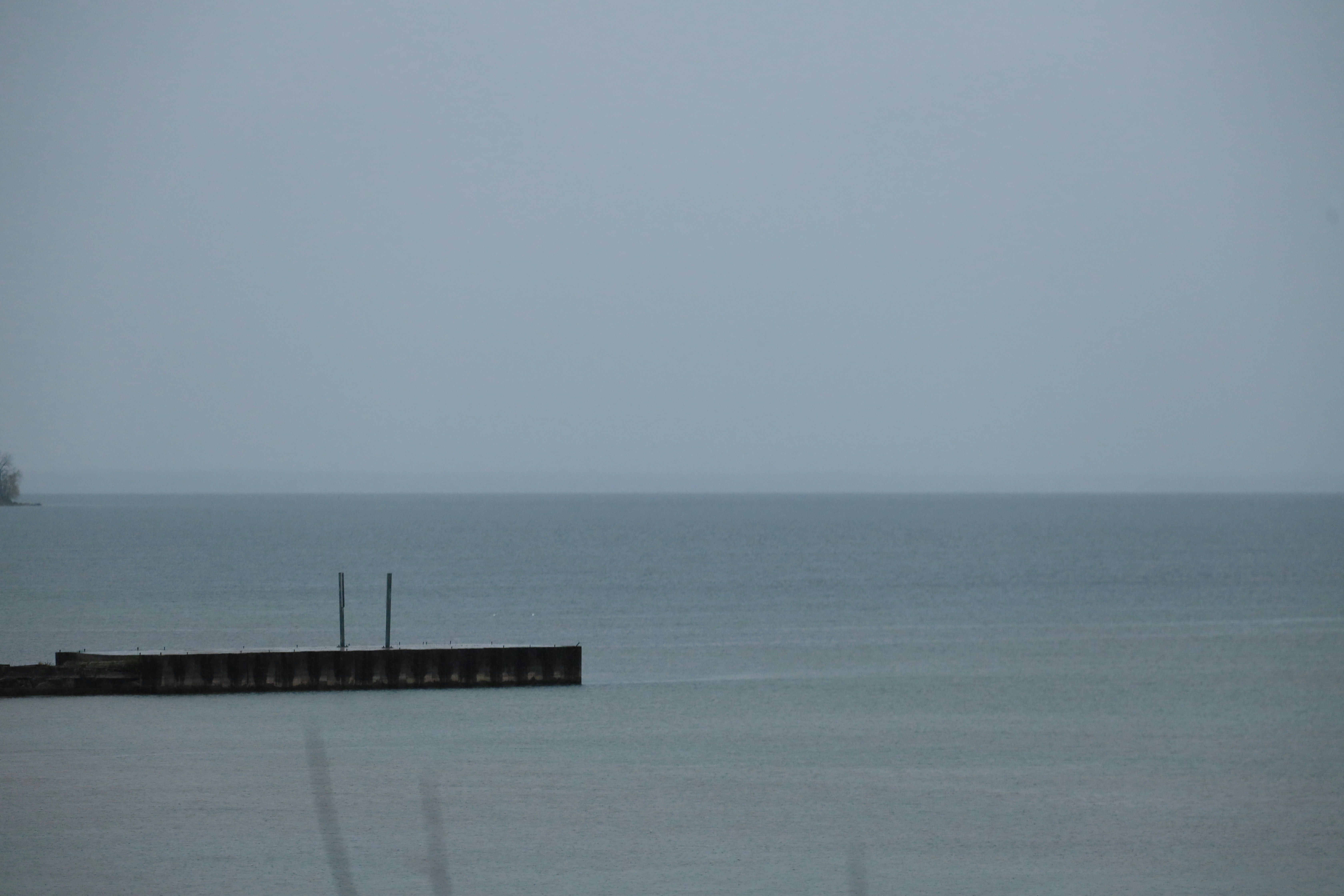 A pier on a calm, overcast day