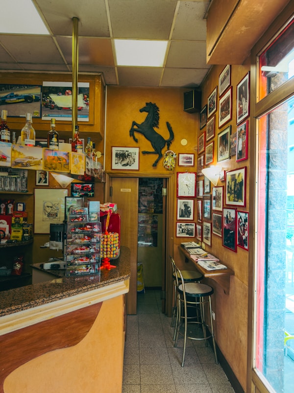 Sports memorabilia and fan decor displayed on a cafe wall
