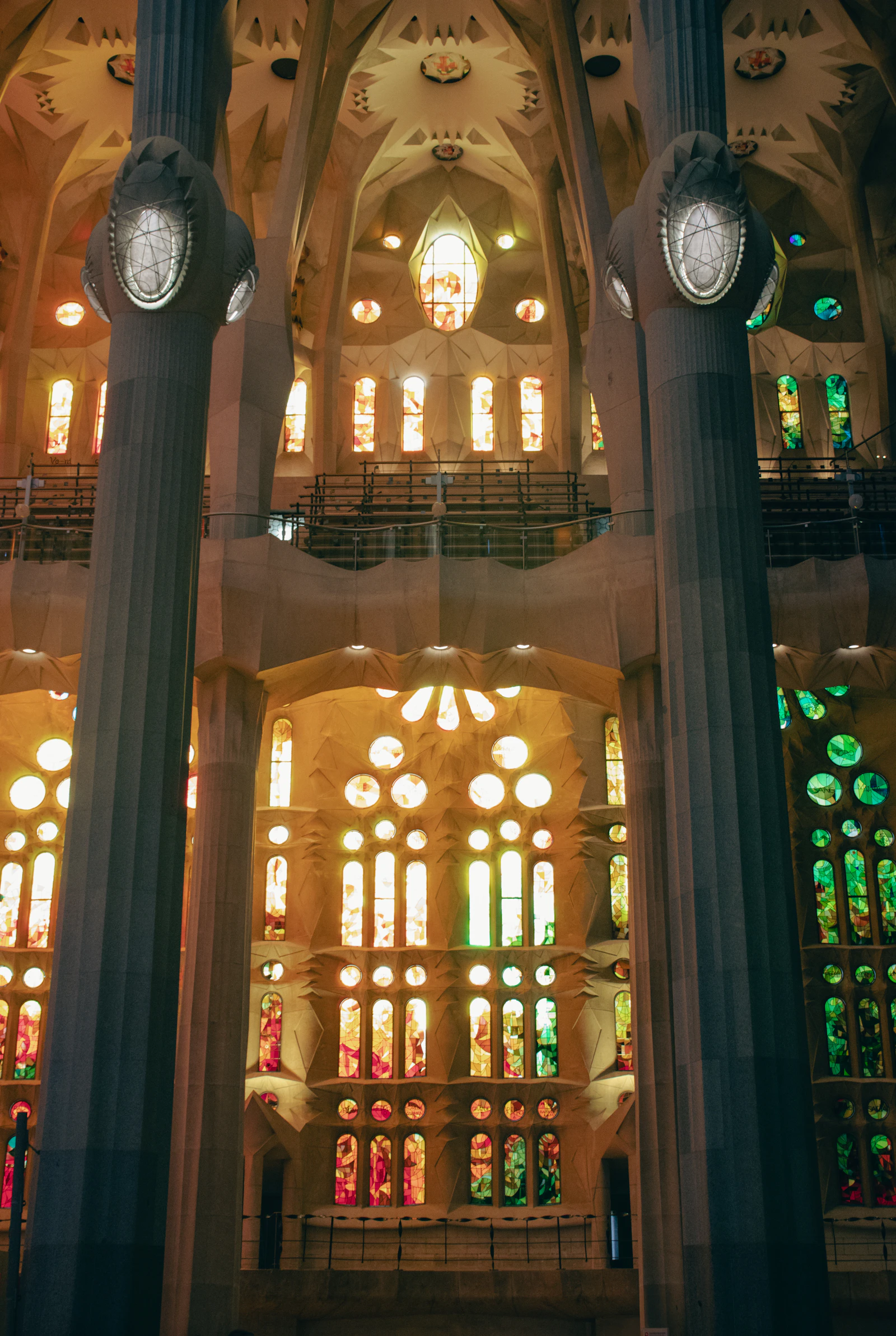 Tree-like columns and stained-glass windows inside the Sagrada Familia.