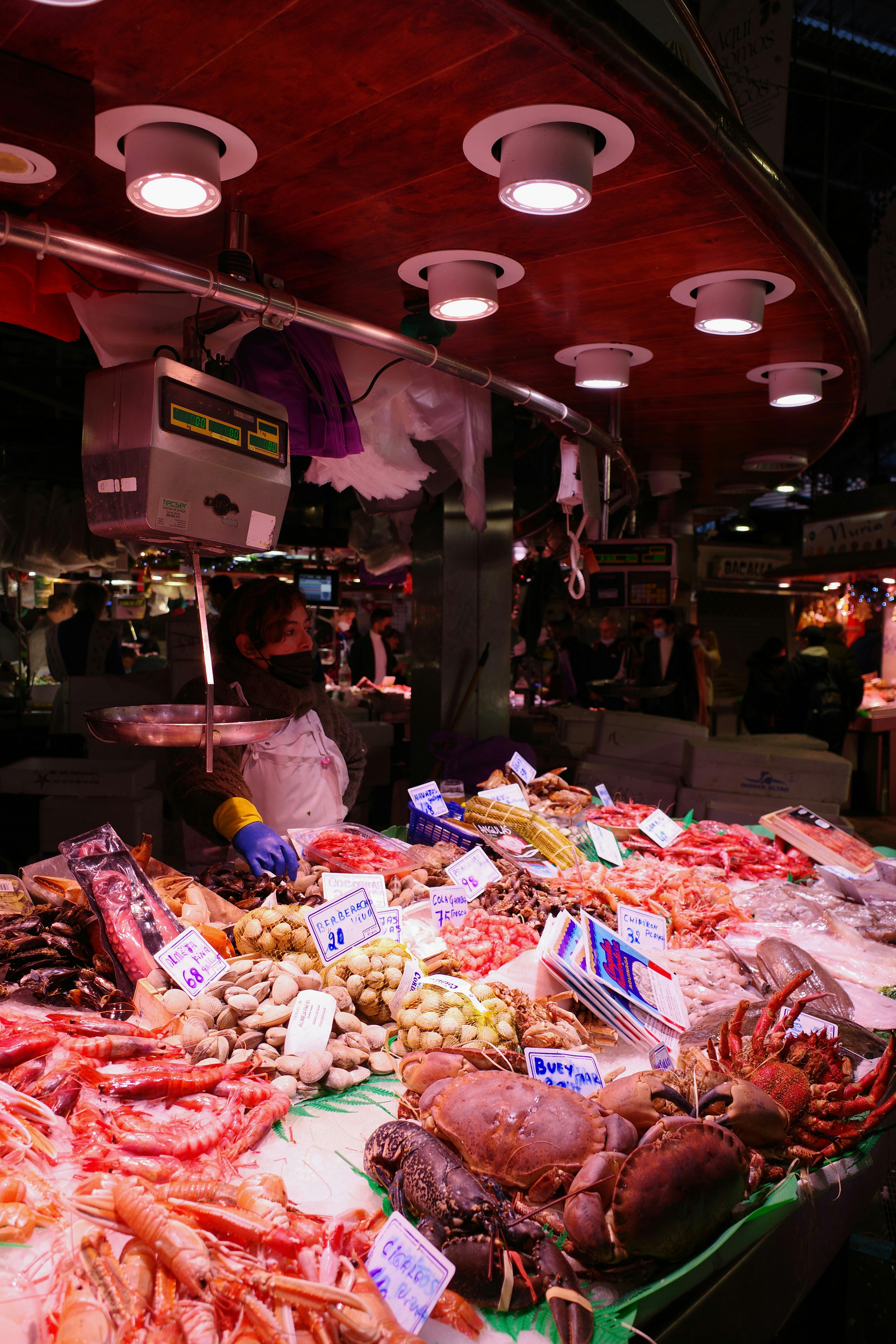 Fresh seafood displayed at a market stall.