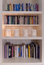 Bookshelves with decorative numbered candle holders