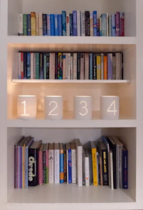 Bookshelves with decorative numbered candle holders