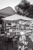 Outdoor cafe seating with umbrellas and umbrellas