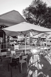 Outdoor cafe seating with umbrellas and umbrellas