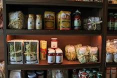 Specialty food market shelves displaying packaged food products