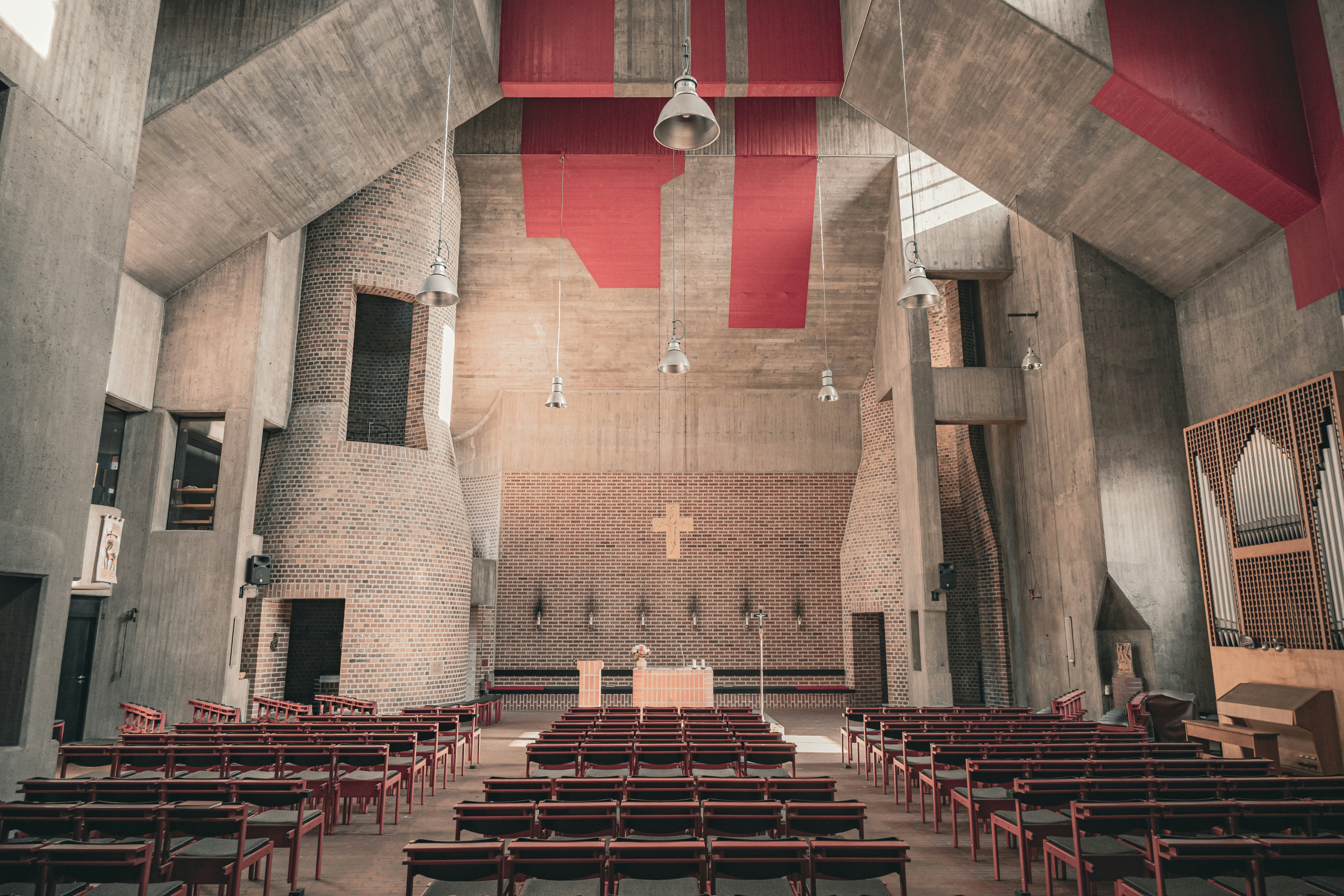 Modern church interior with rows of seats and altar