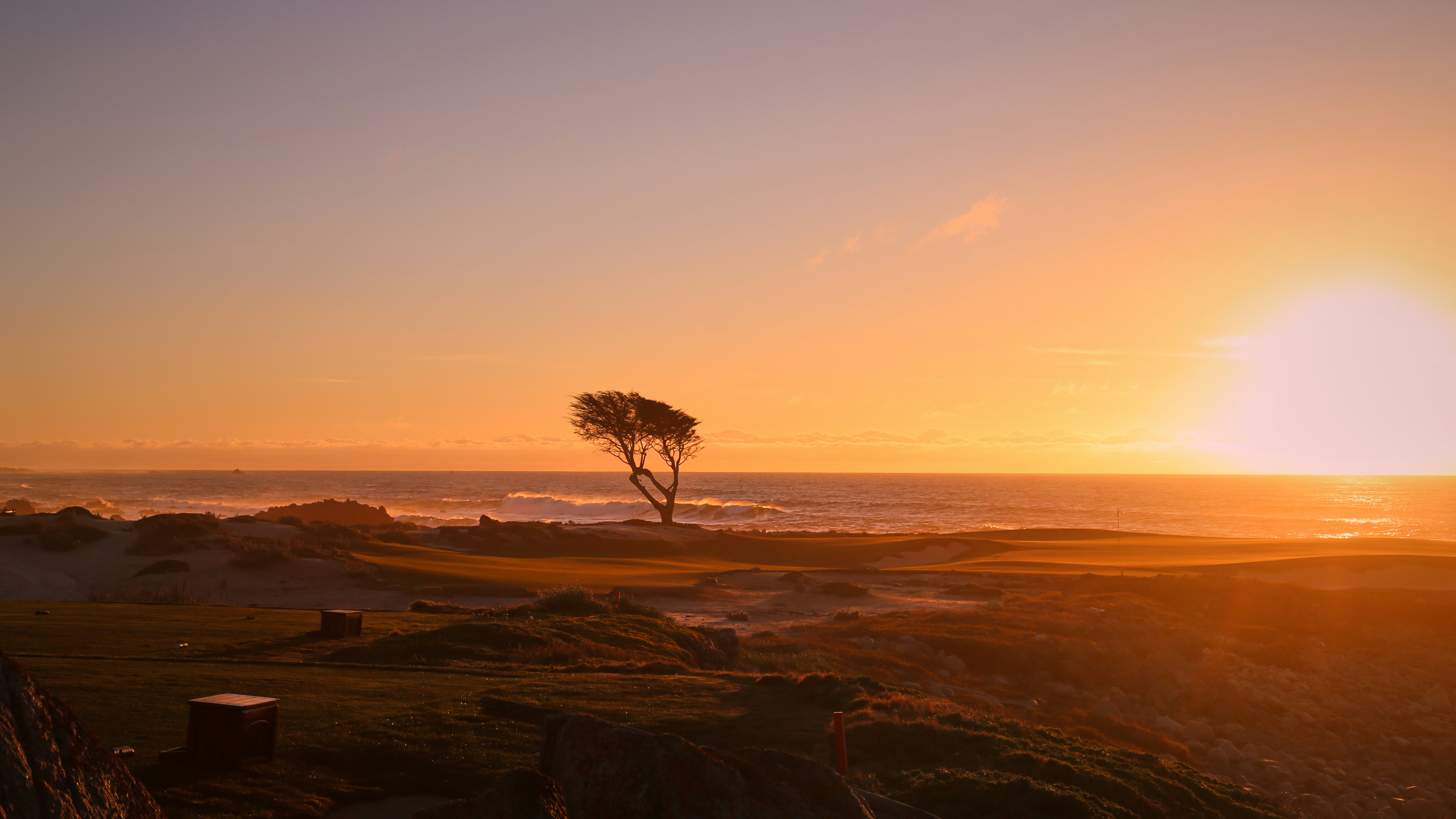 Golfer lining up a shot on a scenic golf course