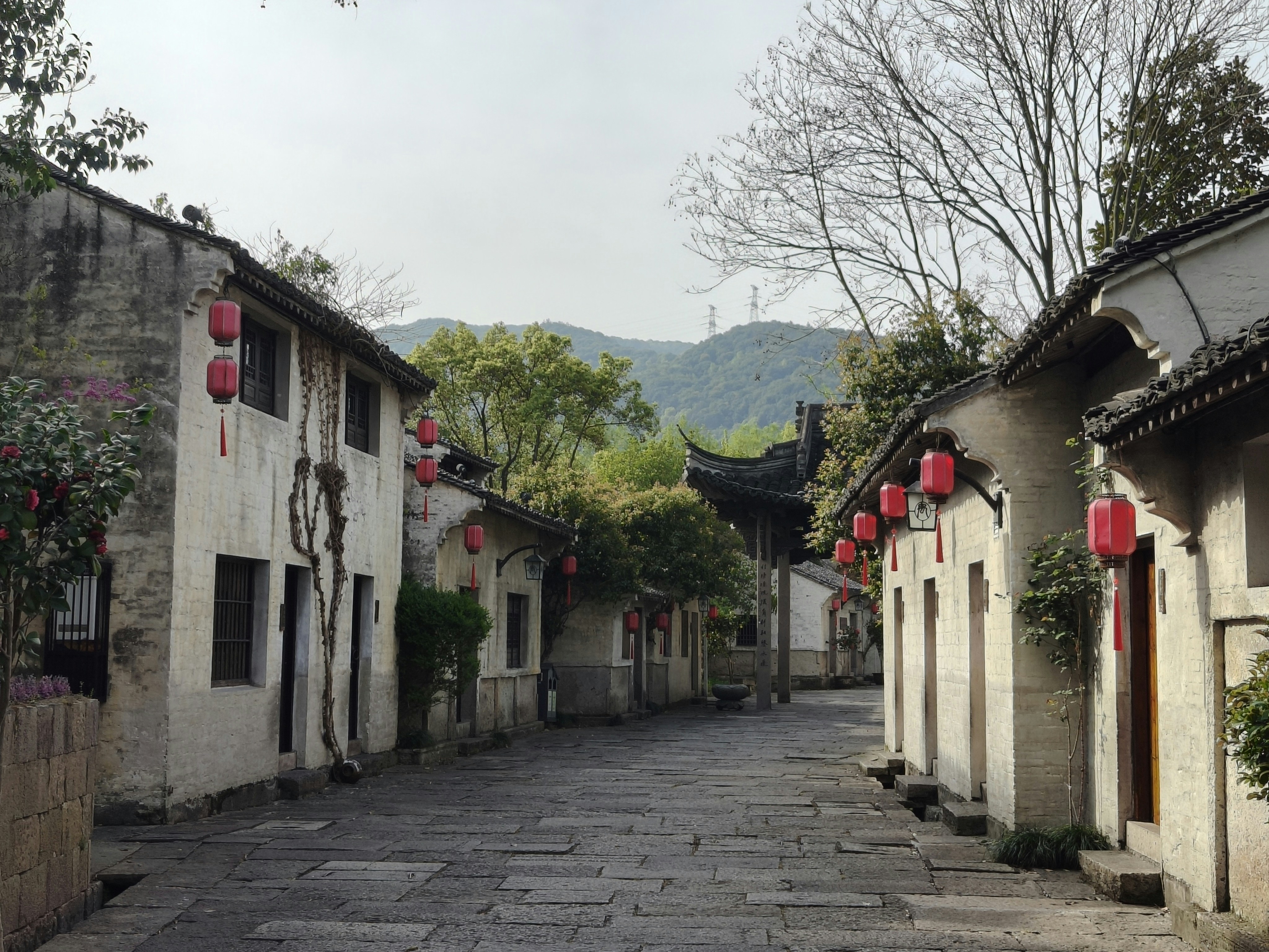 Traditional chinese village street with red lanterns.