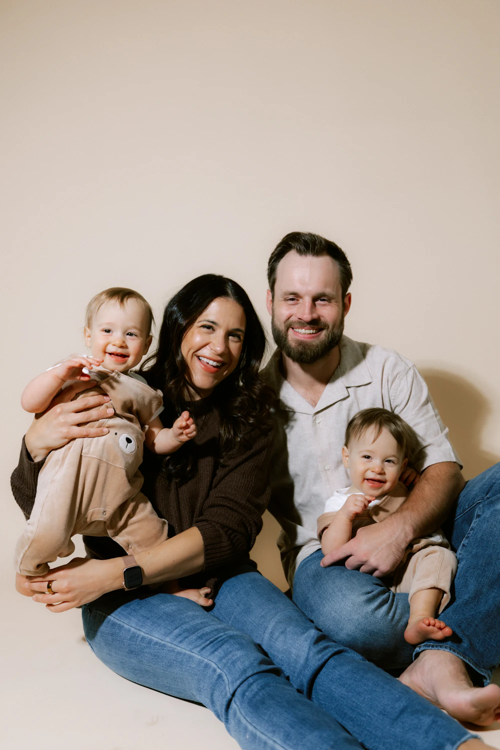 A happy family with two young children