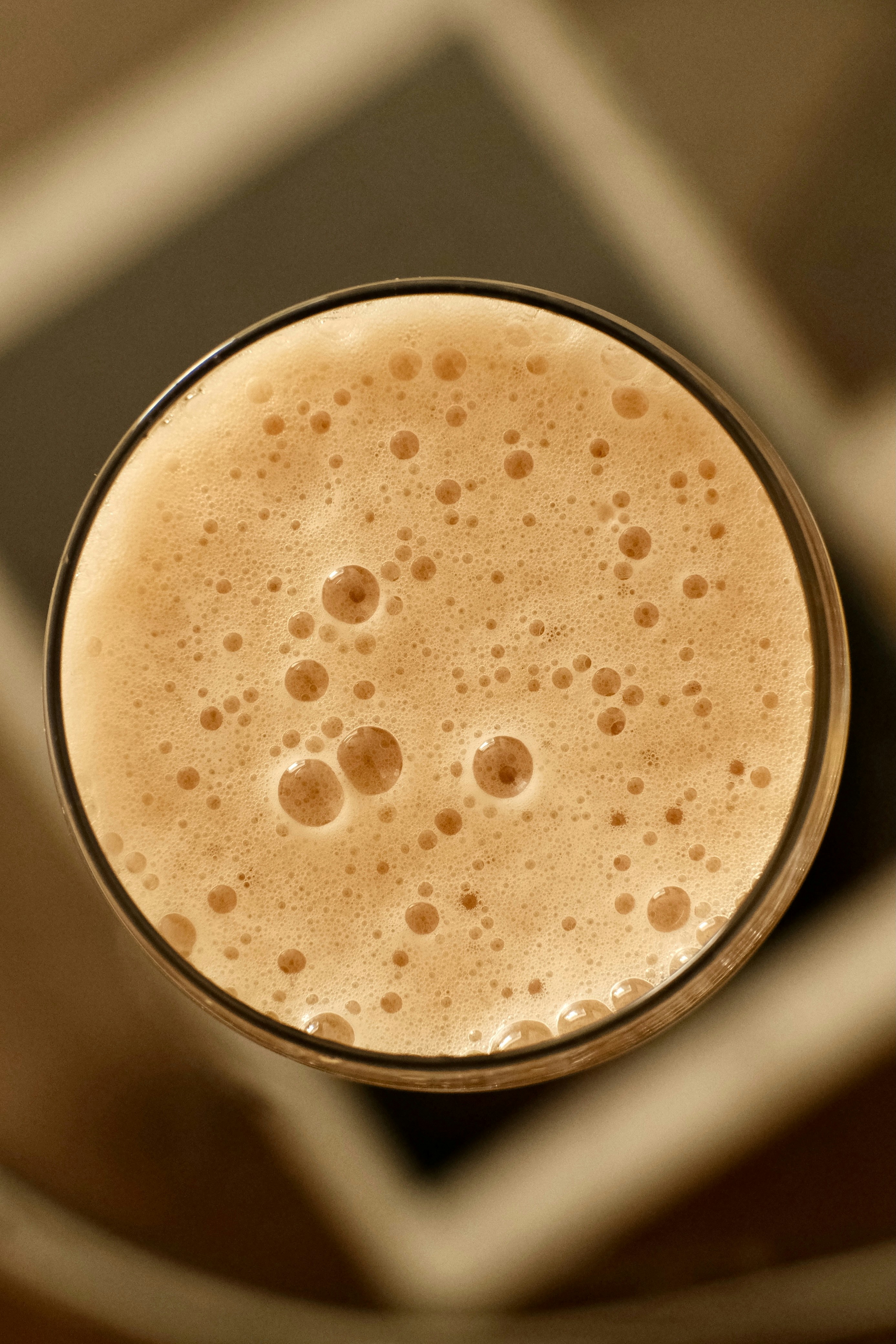 Close-up overhead view of a frothy beverage