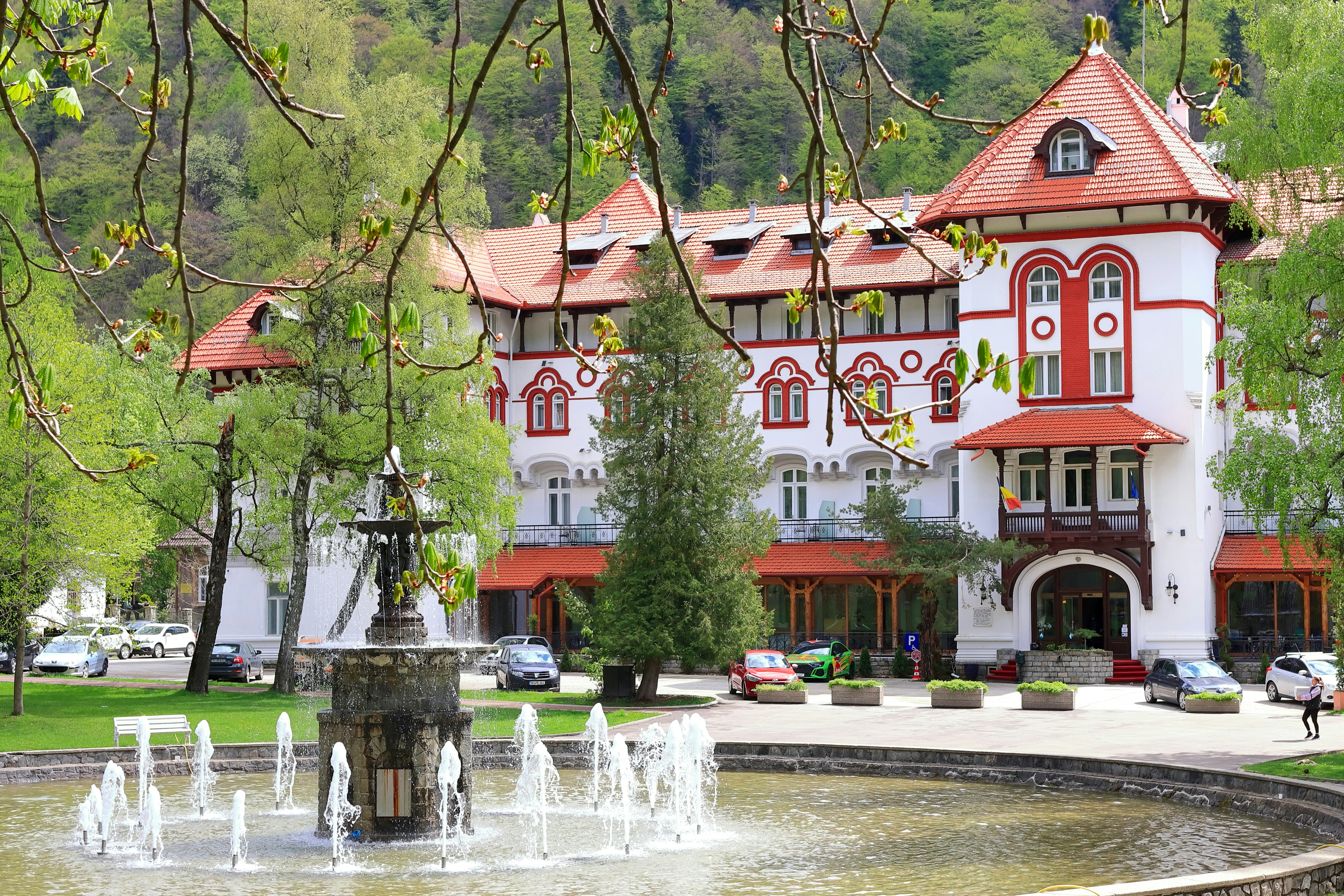 Historic building with a fountain in front
