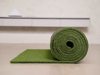 Rolled artificial grass on a light floor
