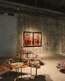 Colorful abstract art displayed in a gallery setting.