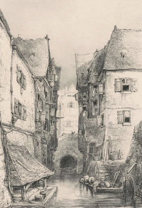 A canal runs between old buildings with shutters.