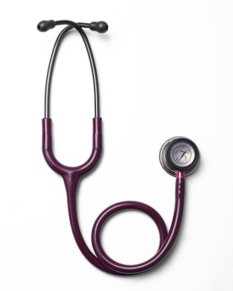 A modern stethoscope on a white background