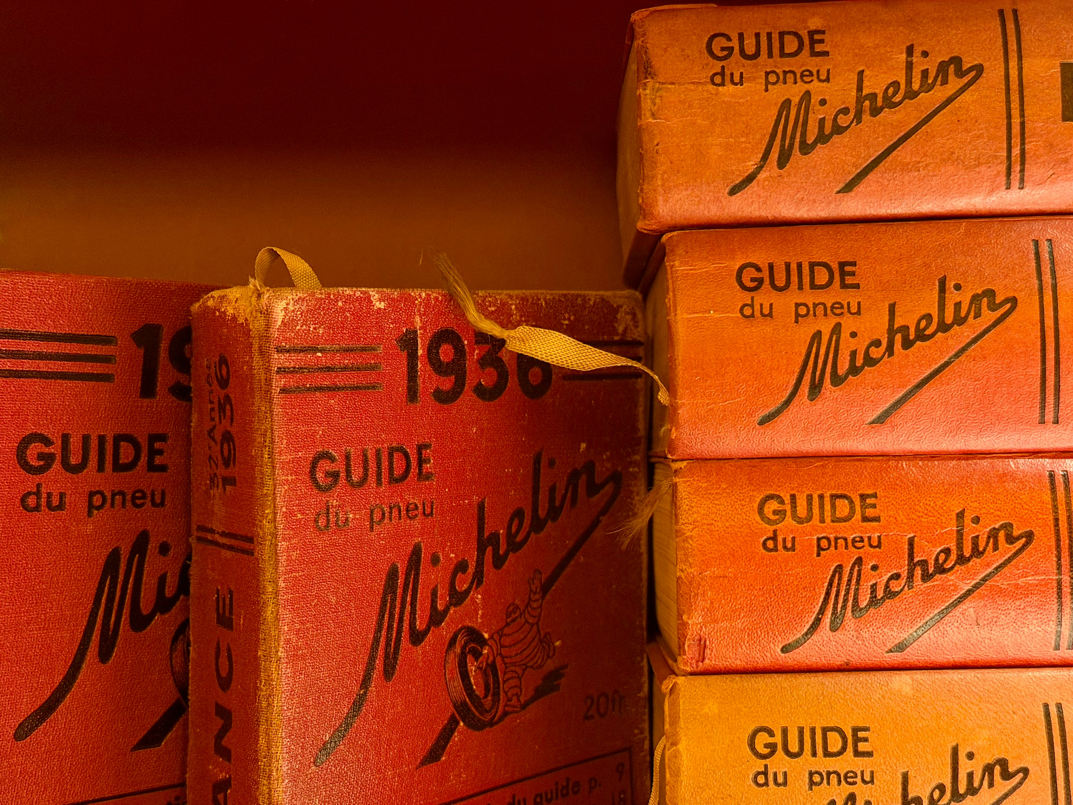 Stack of vintage michelin guide books