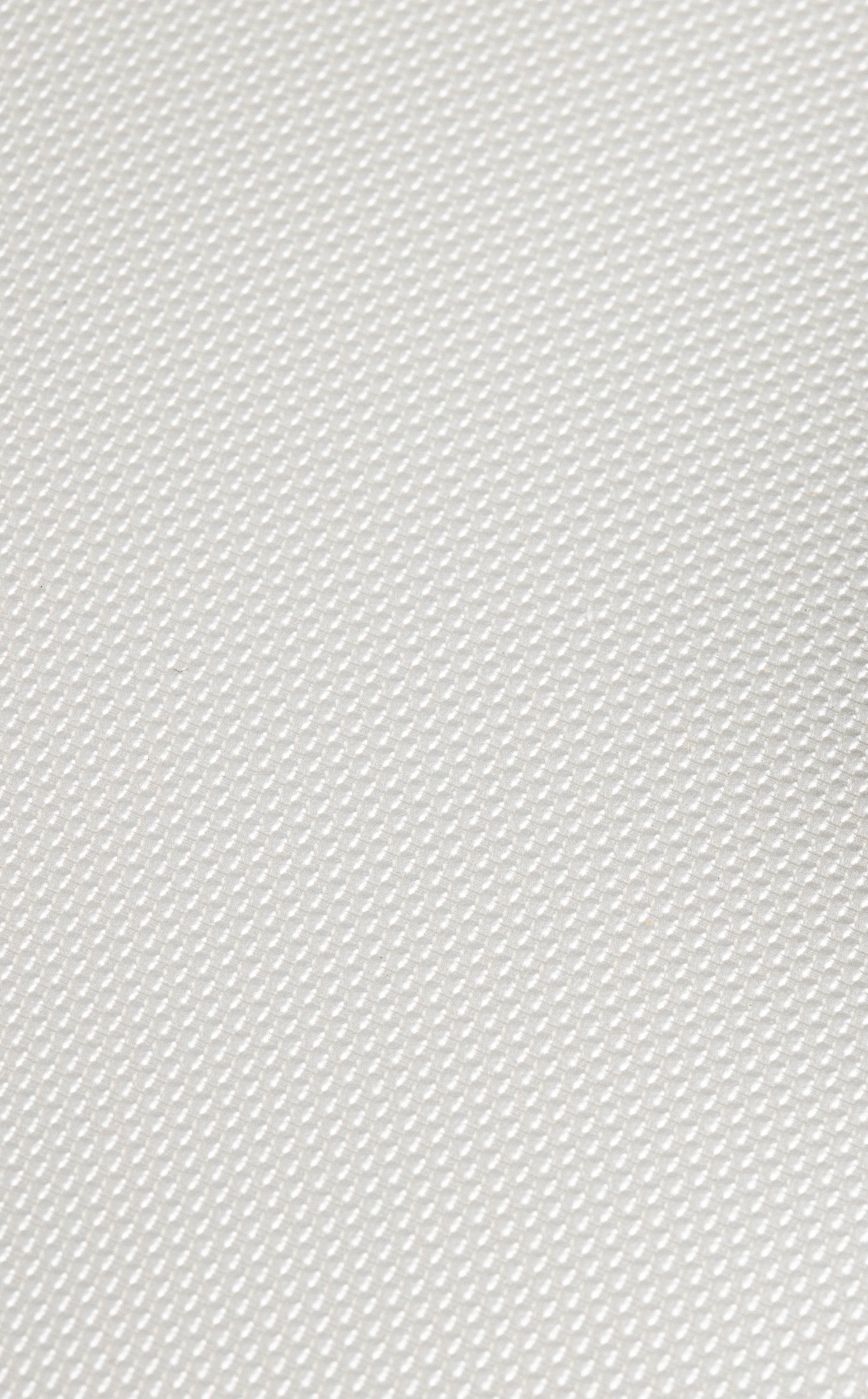A white textured background with a subtle pattern