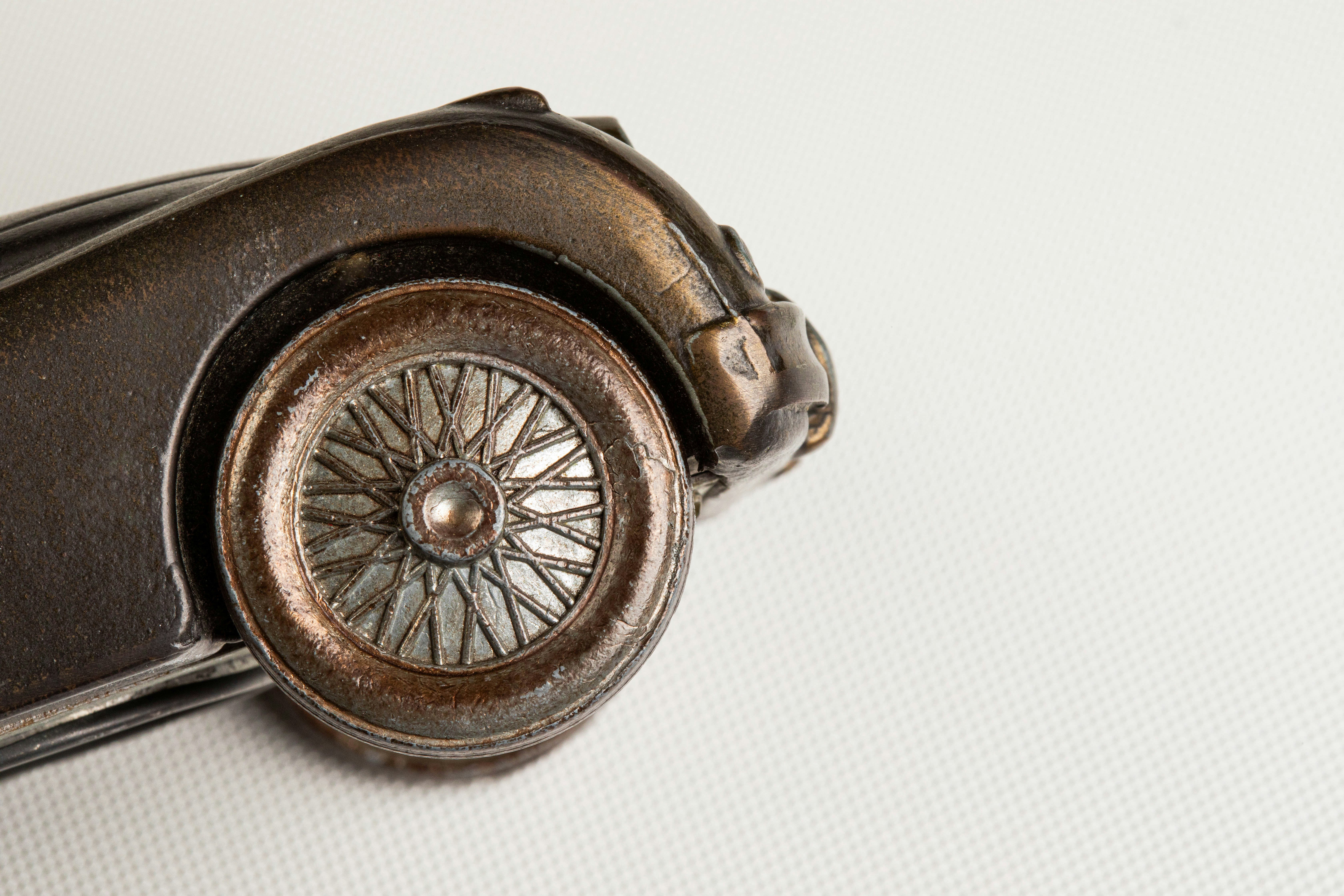 Close-up of a vintage car model wheel and body