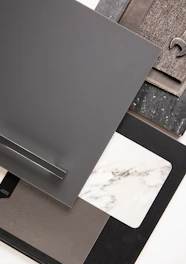 Various material samples arranged on a white surface