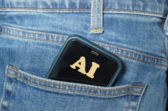 Smartphone with ai text in jeans pocket